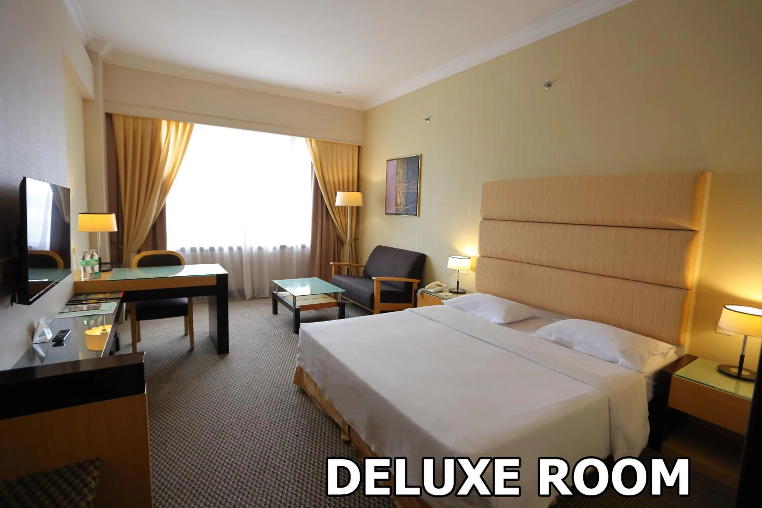 Bed in Dynasty Hotel Miri