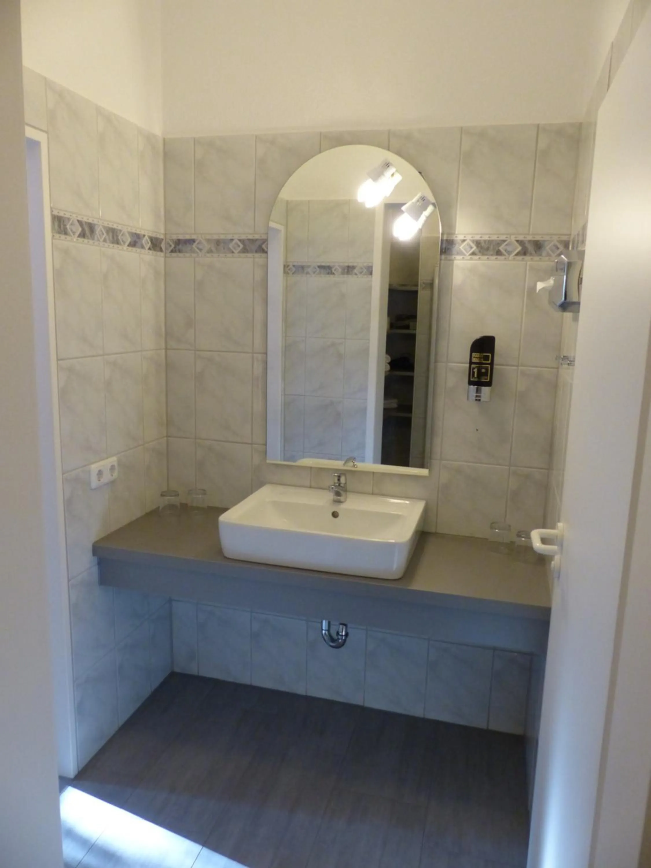 Bathroom in Strand-Hotel