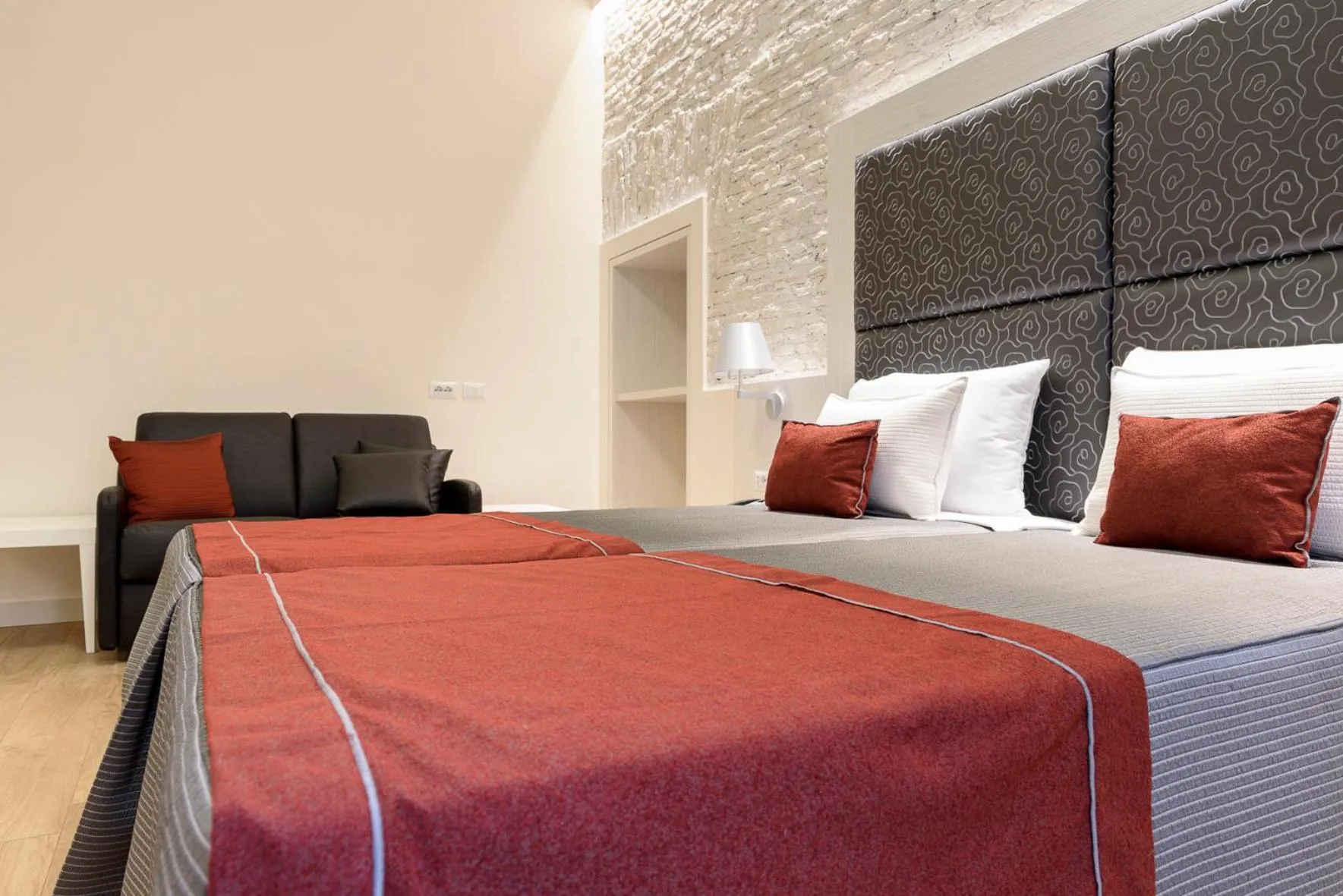 Bed in Navona Luxury Guesthouse