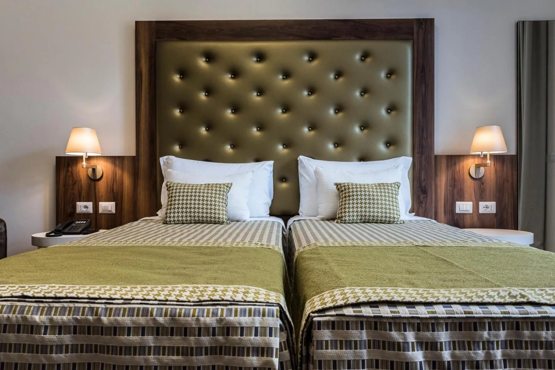 Bed in Navona Luxury Guesthouse