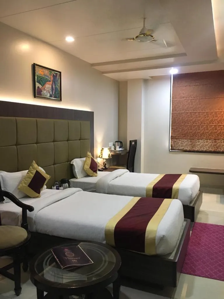 Bed in Hotel Ozas Grand