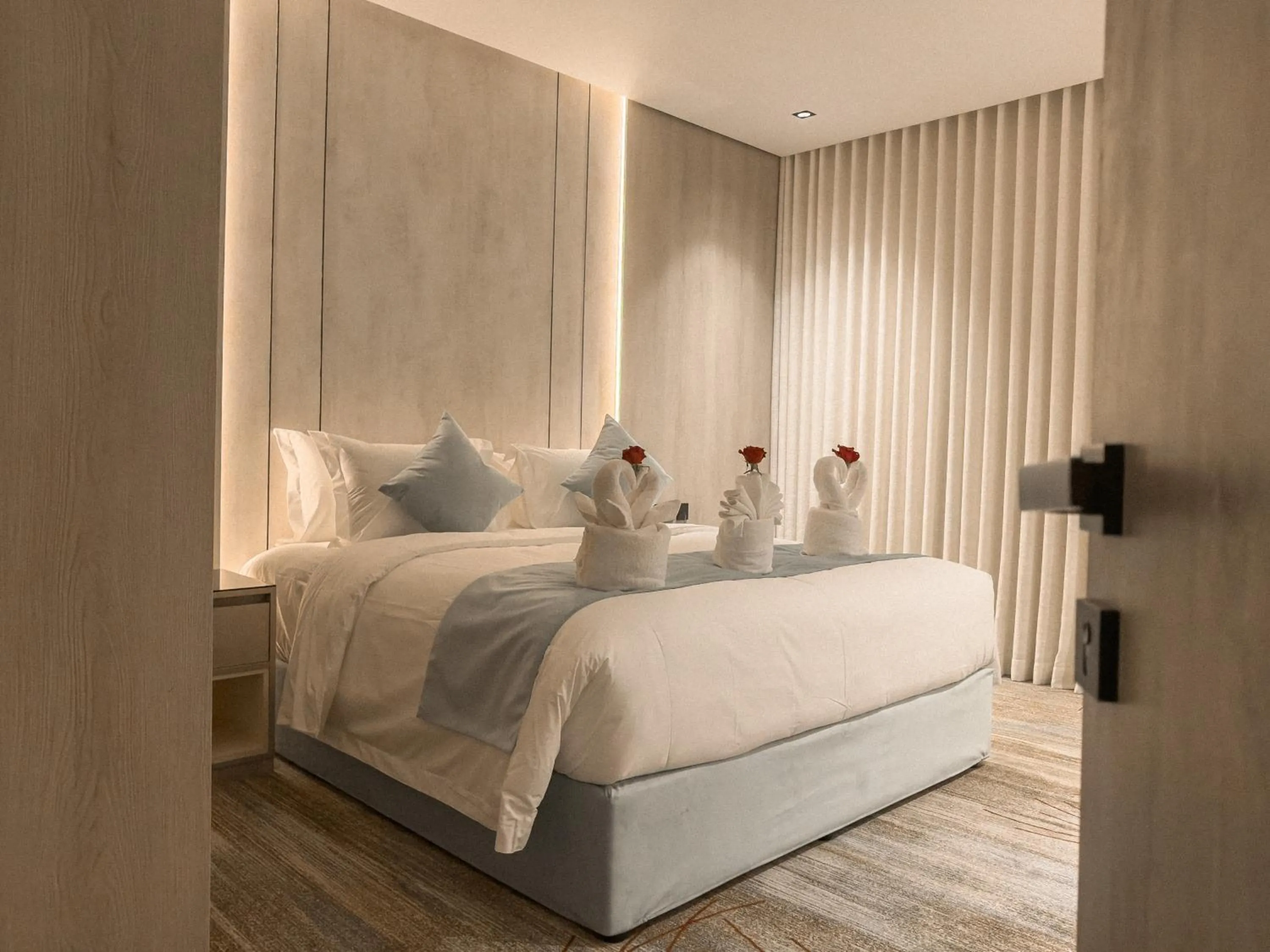 Bed in Rose Garden Hotel فندق روز جاردن