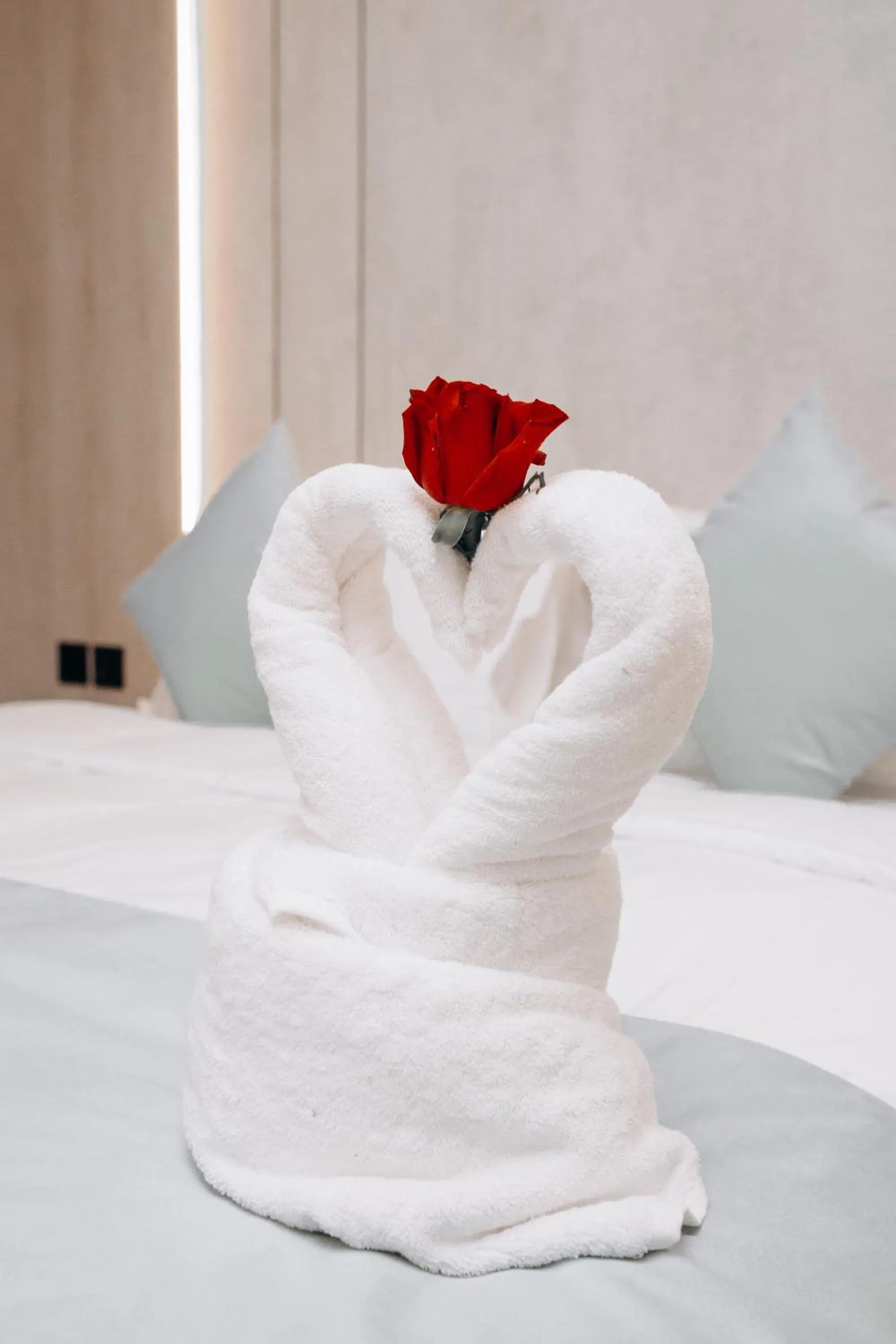 Bed in Rose Garden Hotel فندق روز جاردن