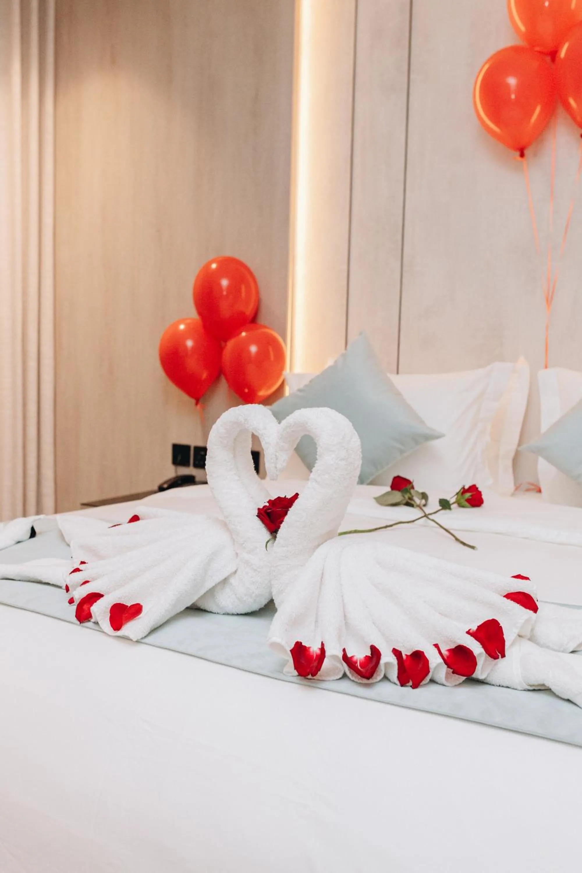 Bed in Rose Garden Hotel فندق روز جاردن