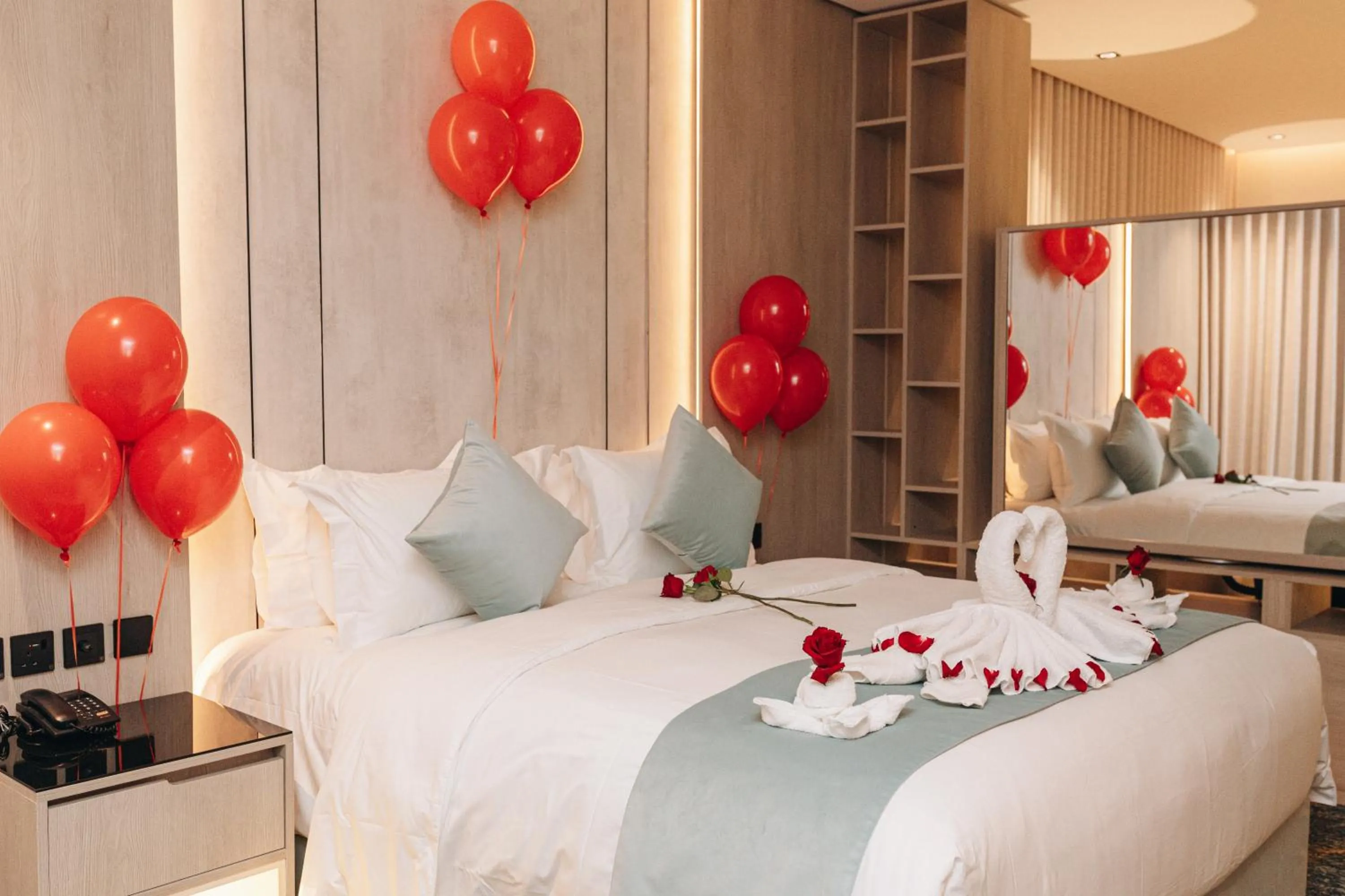 Bed in Rose Garden Hotel فندق روز جاردن