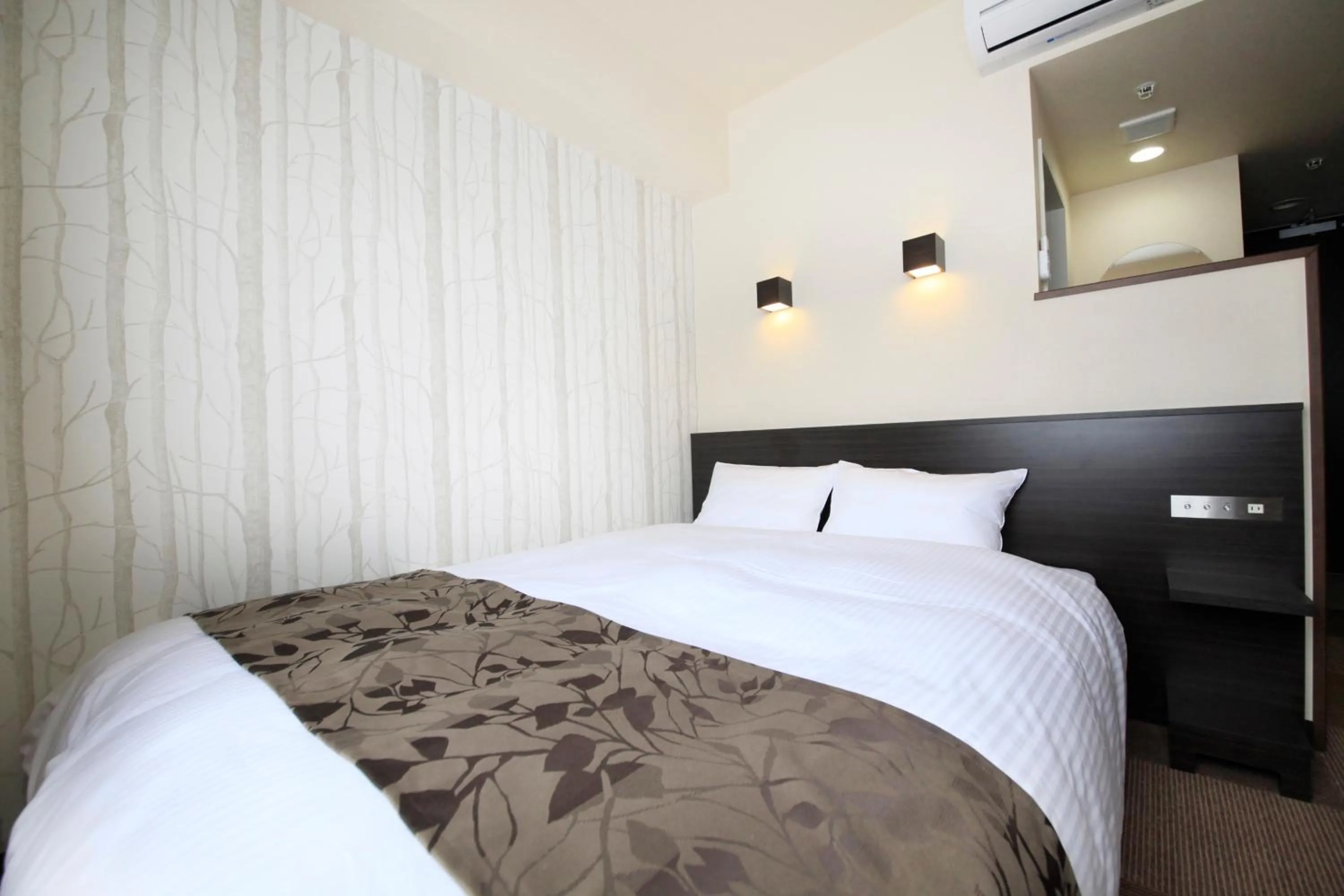 Decorative detail, Bed in Hotel Lifetree Hitachinoushiku