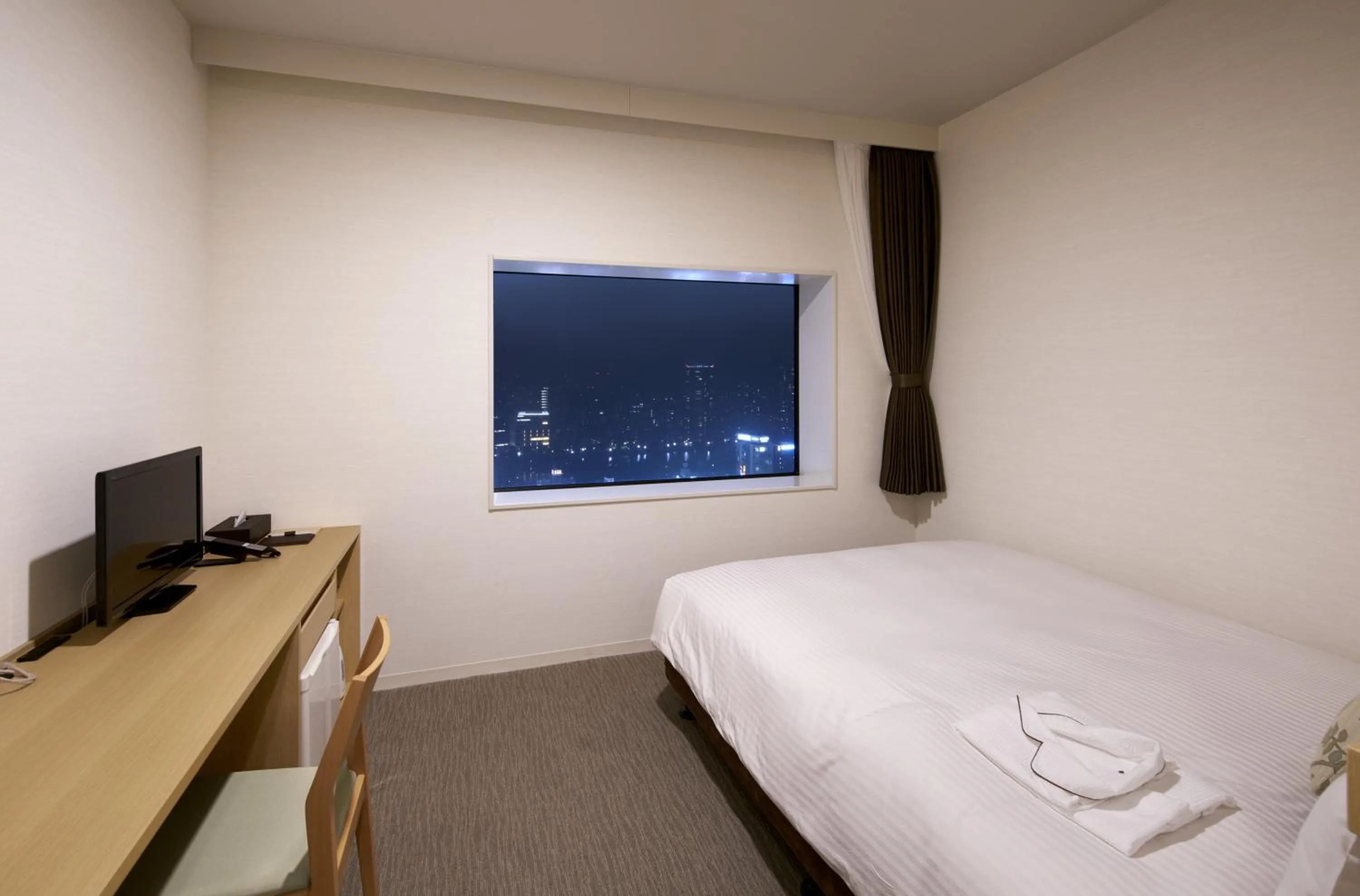 Photo of the whole room, Bed in Hotel Crown Hills Ueno Premier