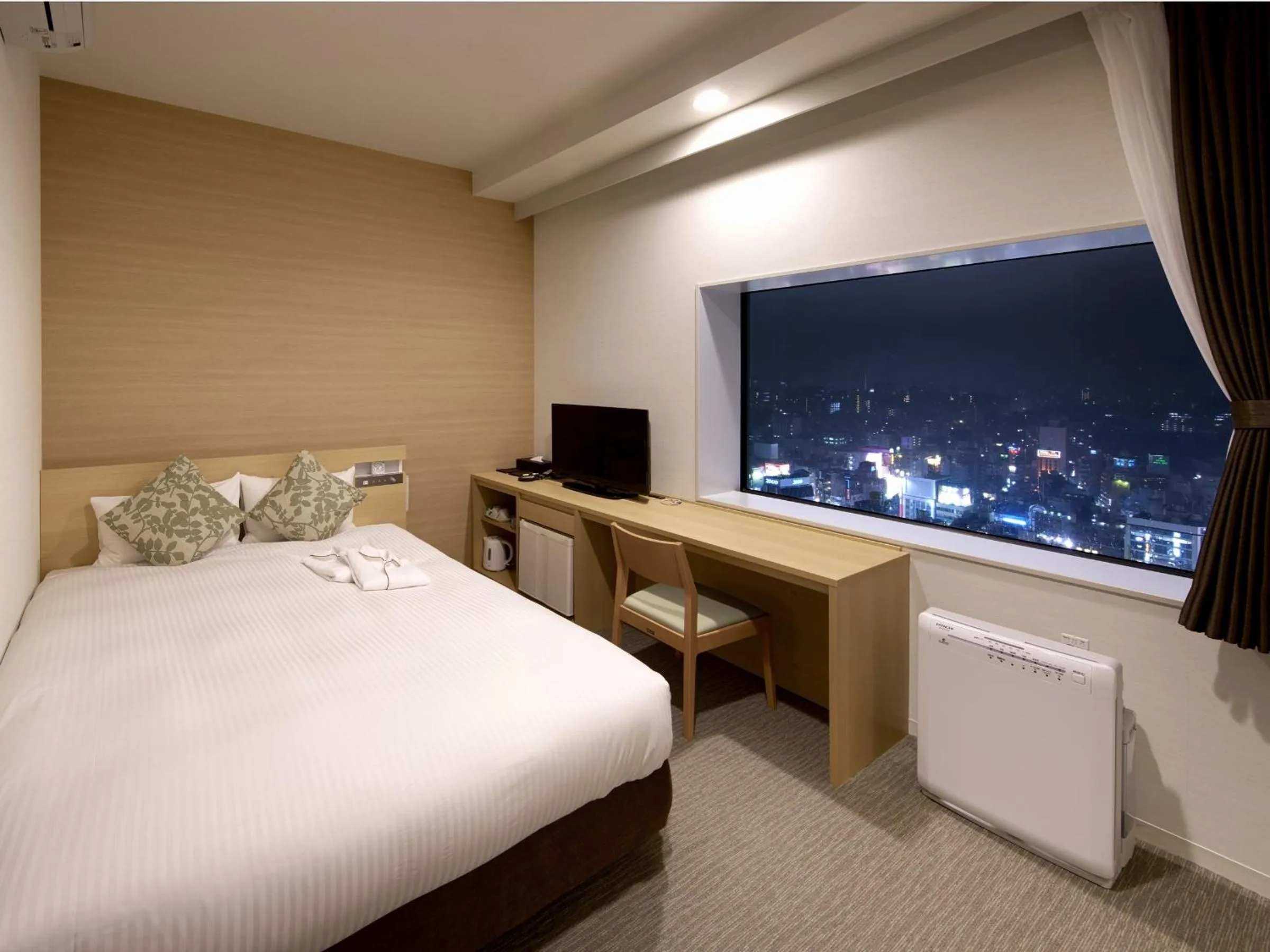 Photo of the whole room, Bed in Hotel Crown Hills Ueno Premier