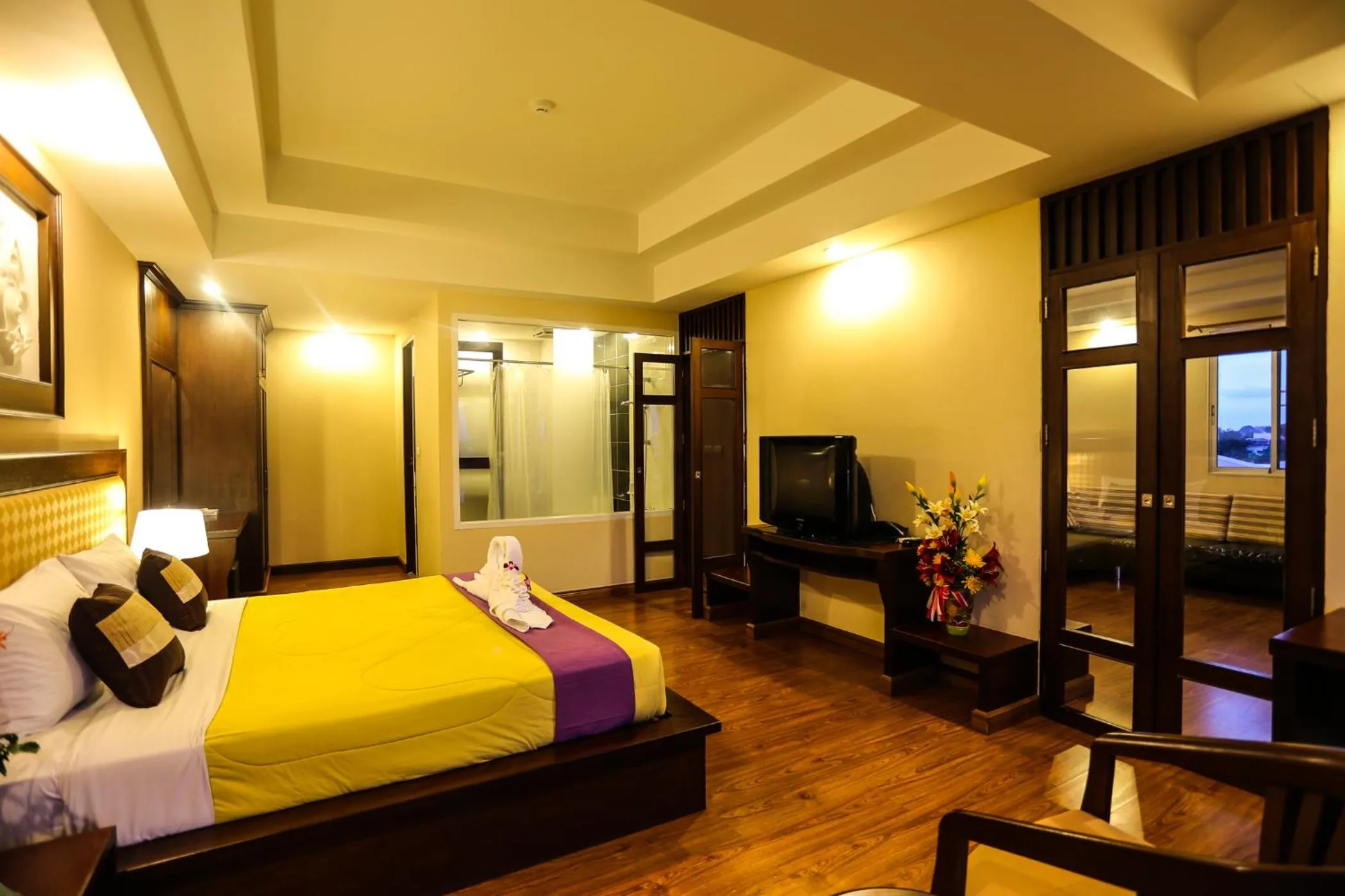 Bed in Madina Rayong Hotel