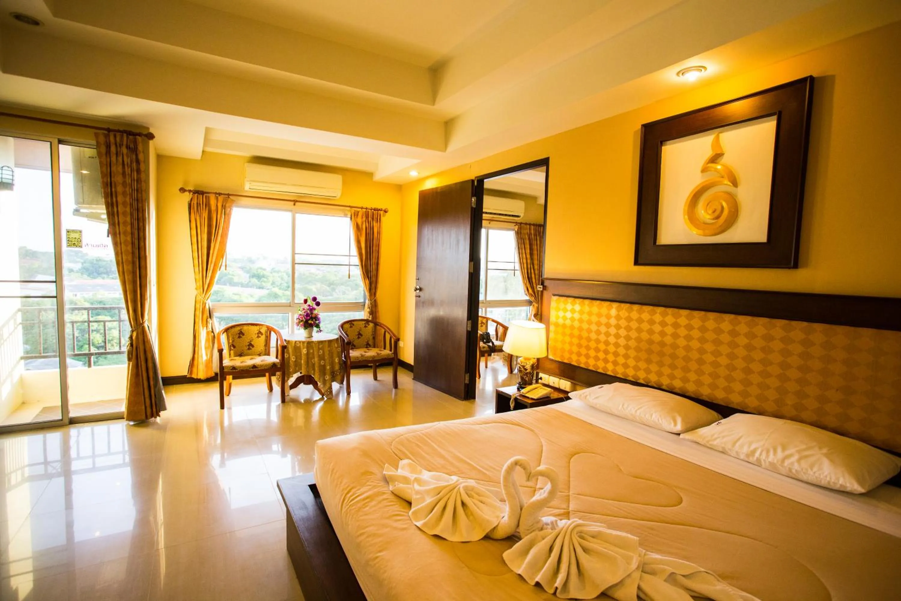 Bed in Madina Rayong Hotel