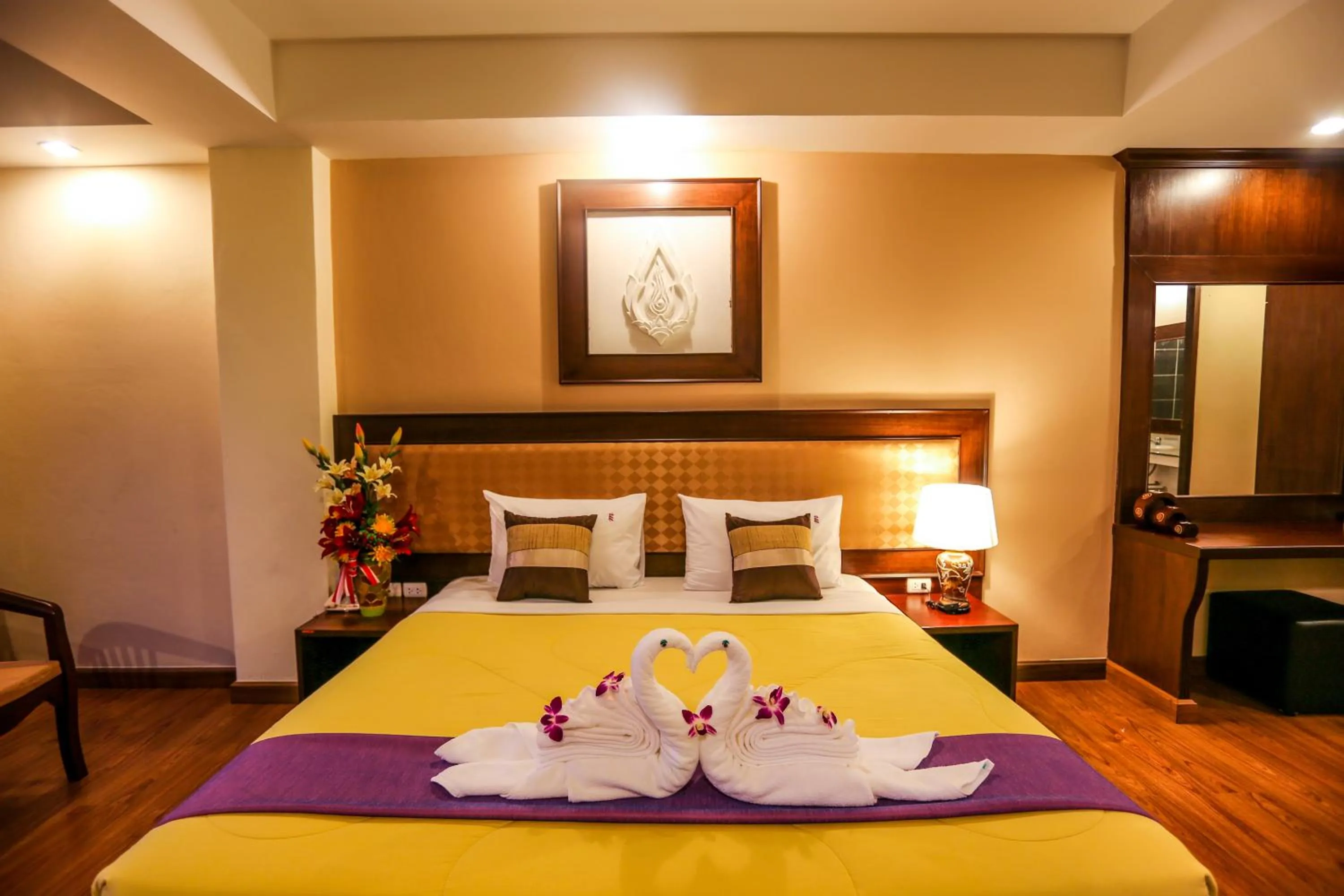 Bed in Madina Rayong Hotel