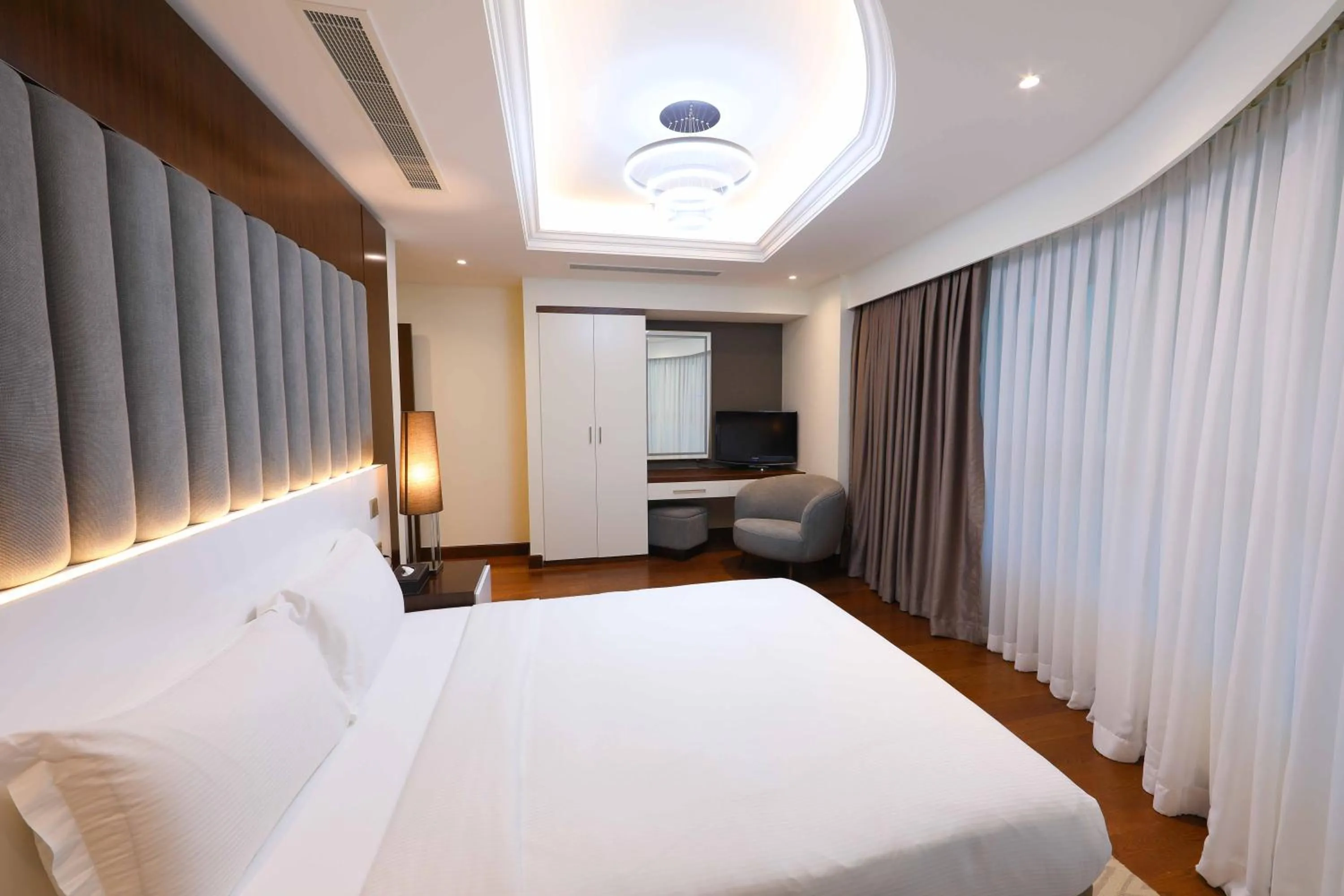 Bed in Number One Tower Suites