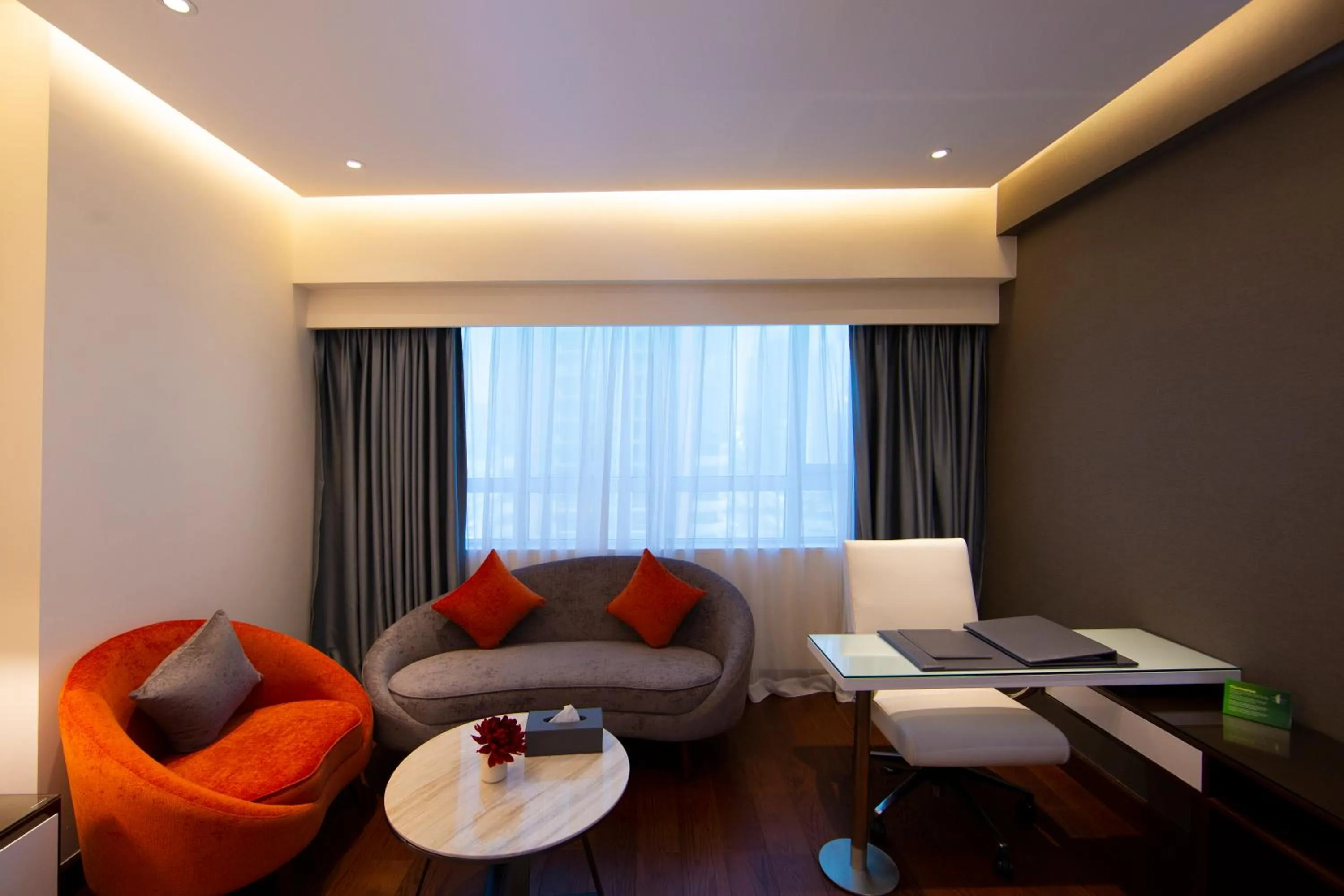 Seating area in Number One Tower Suites