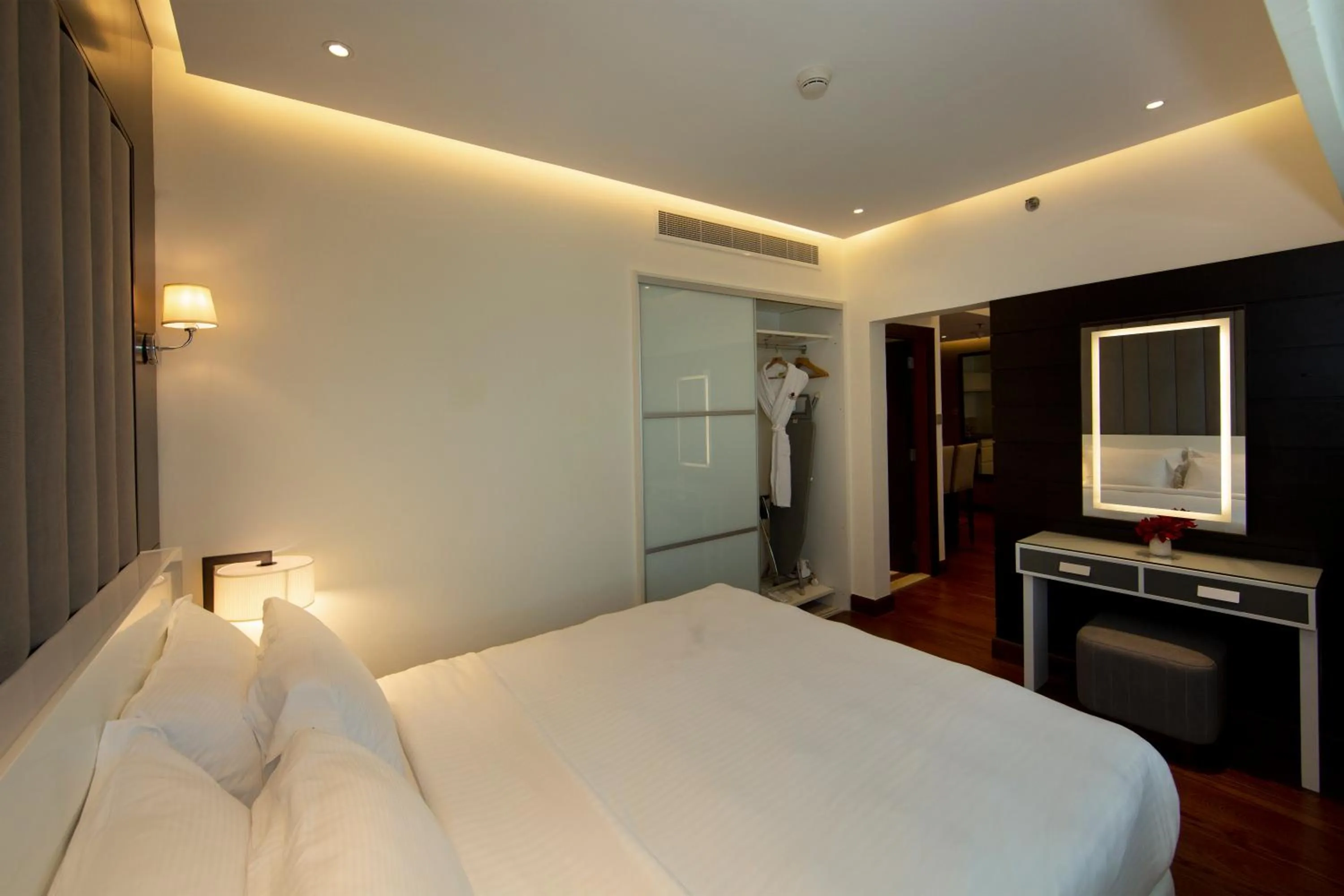 Bed in Number One Tower Suites