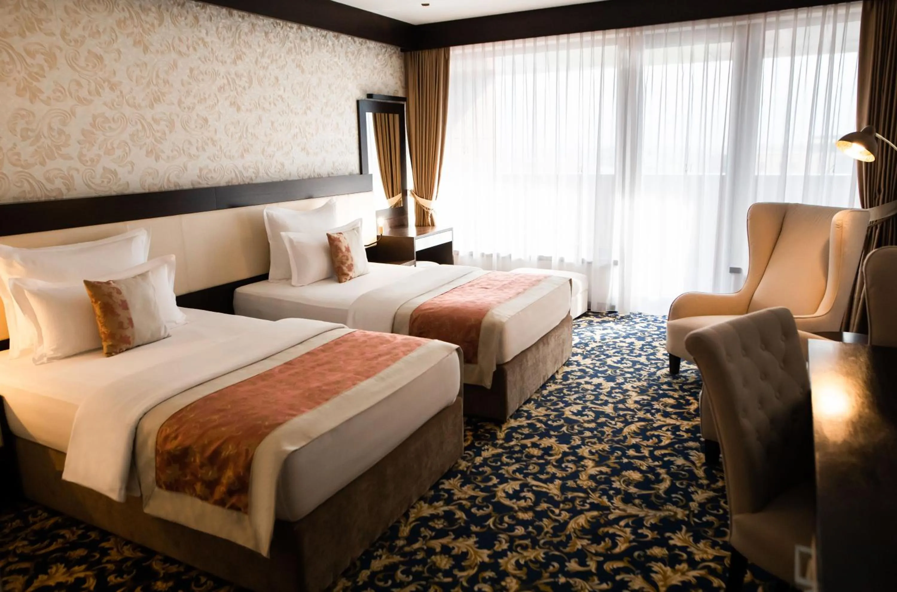 Bed in Malak Regency Hotel