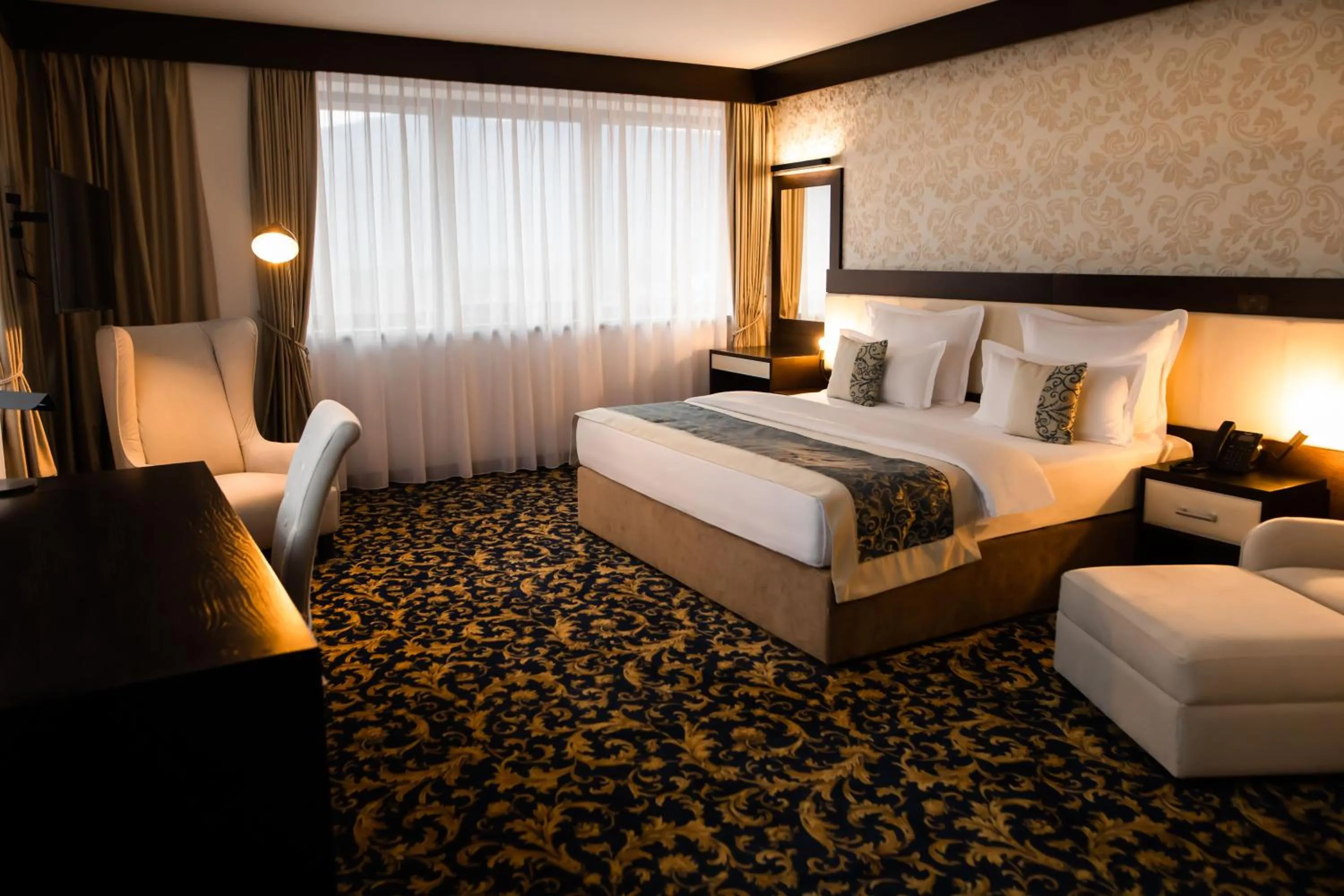 Bed in Malak Regency Hotel