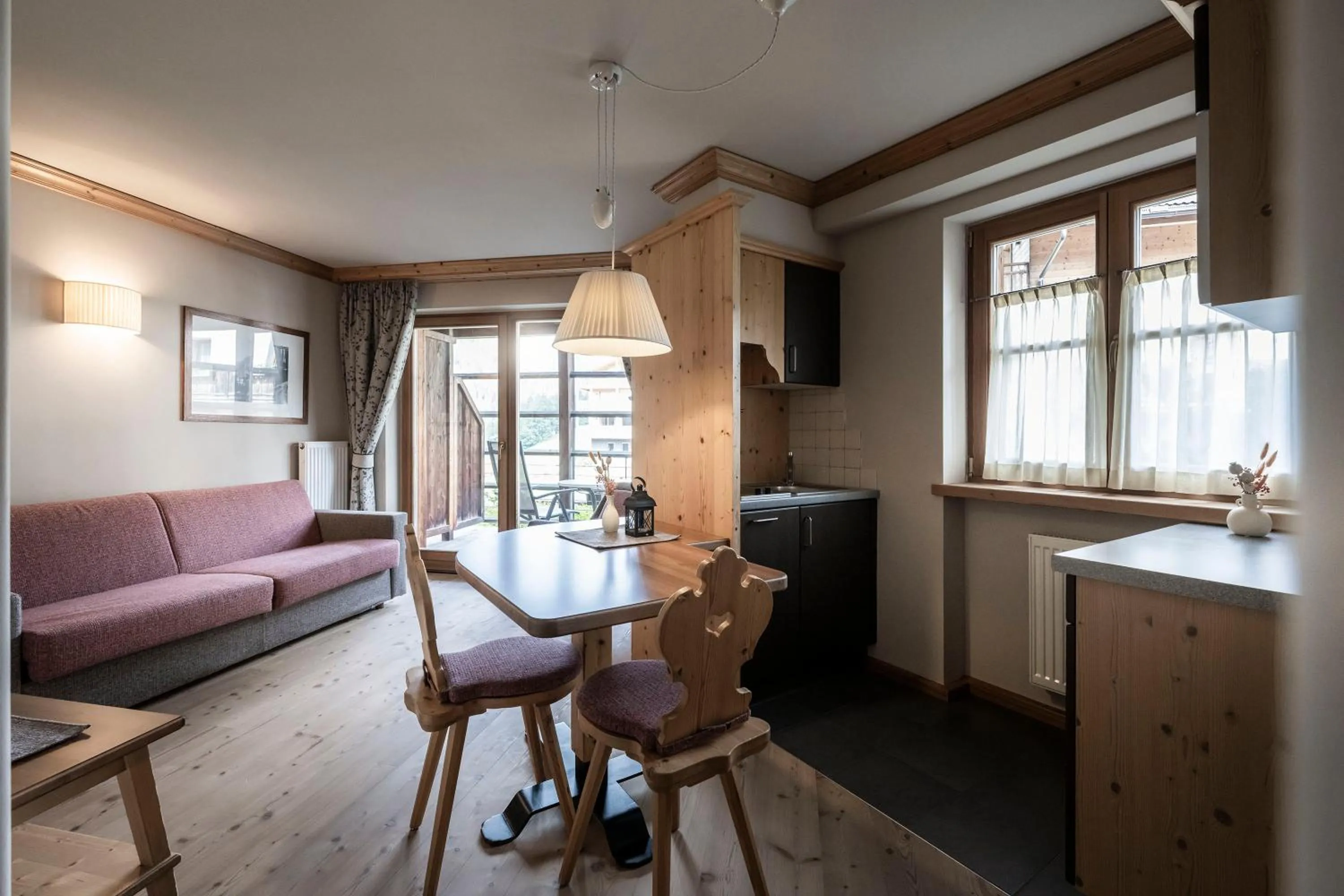 Dining area in Post Alpina - Family Mountain Chalets