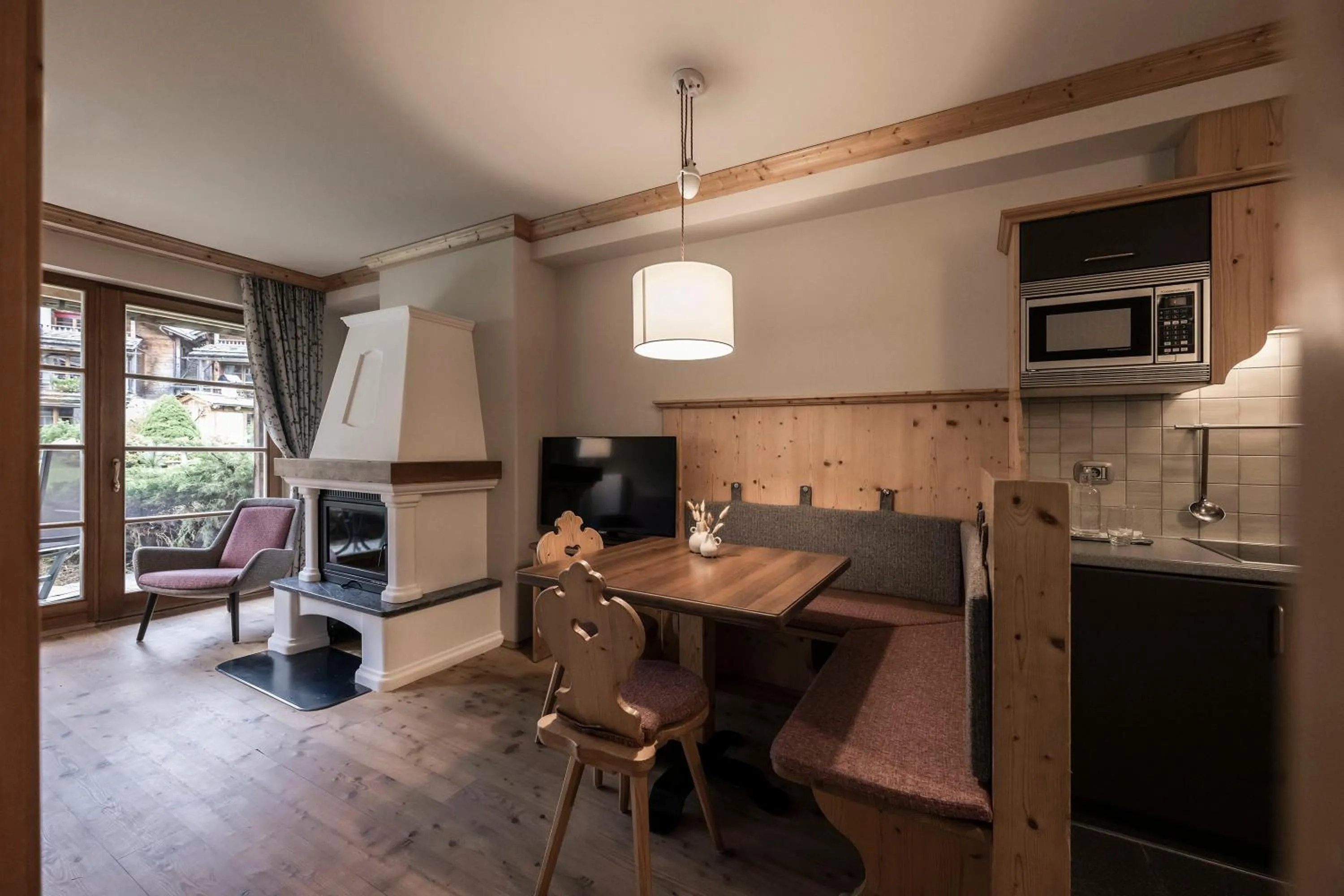 Living room in Post Alpina - Family Mountain Chalets