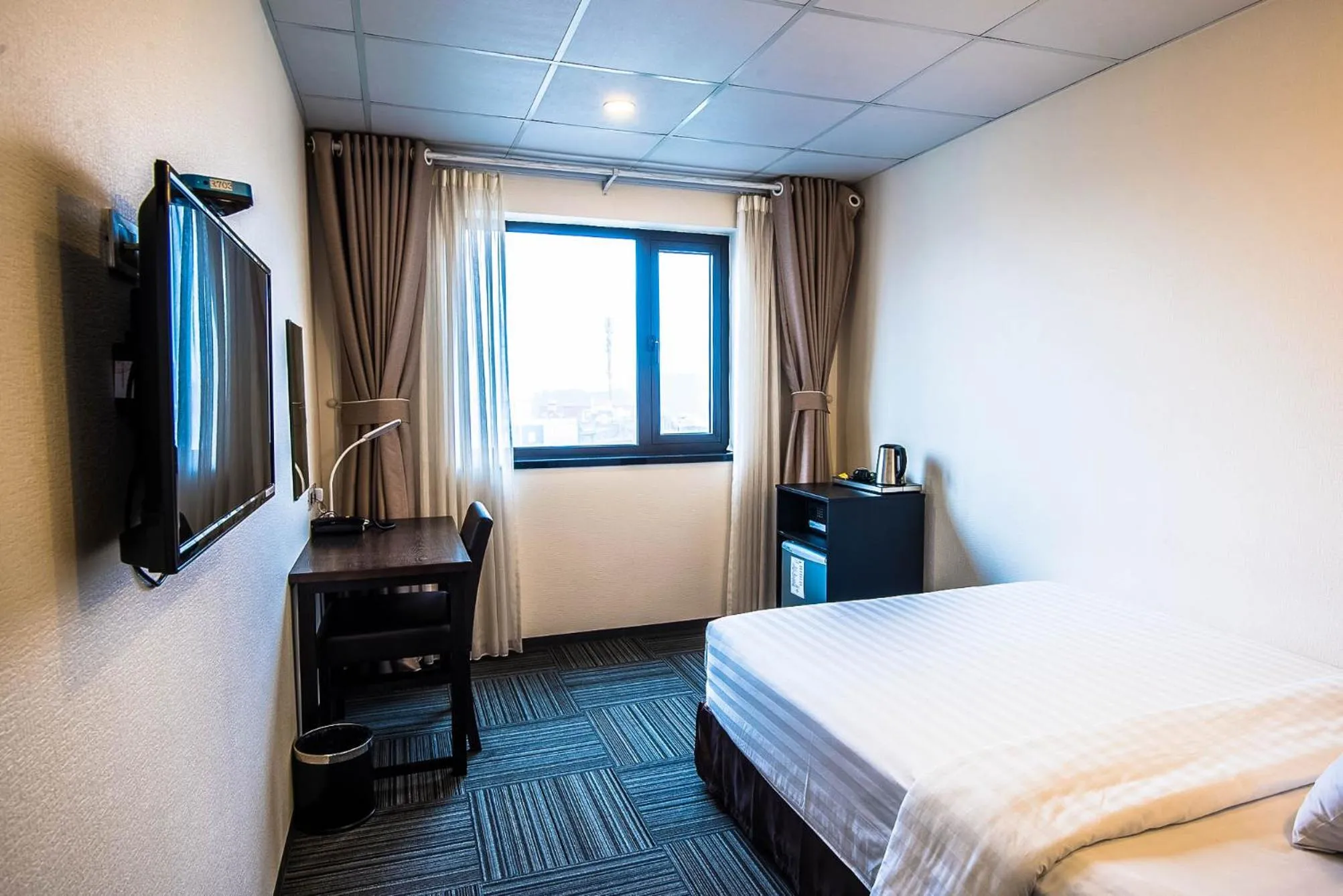 Photo of the whole room, Bed in Sakura Hotel 3