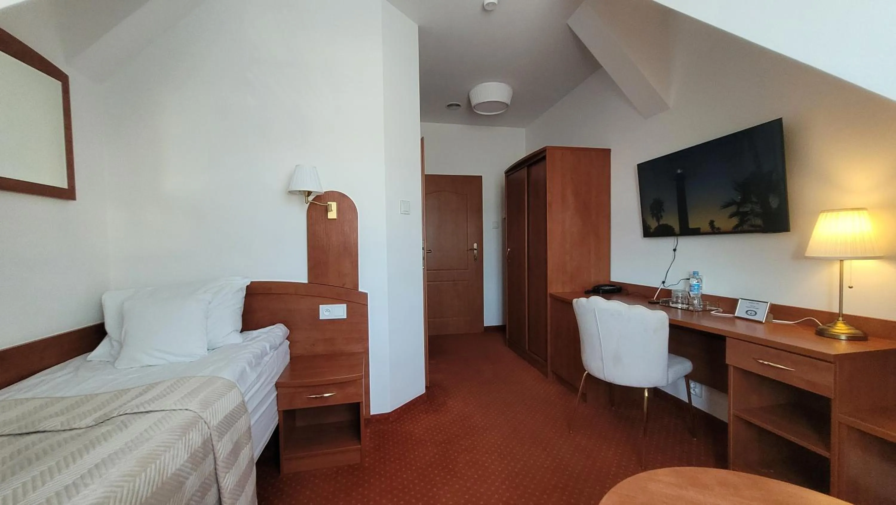 Bed in Hotel Maxim Kwidzyn