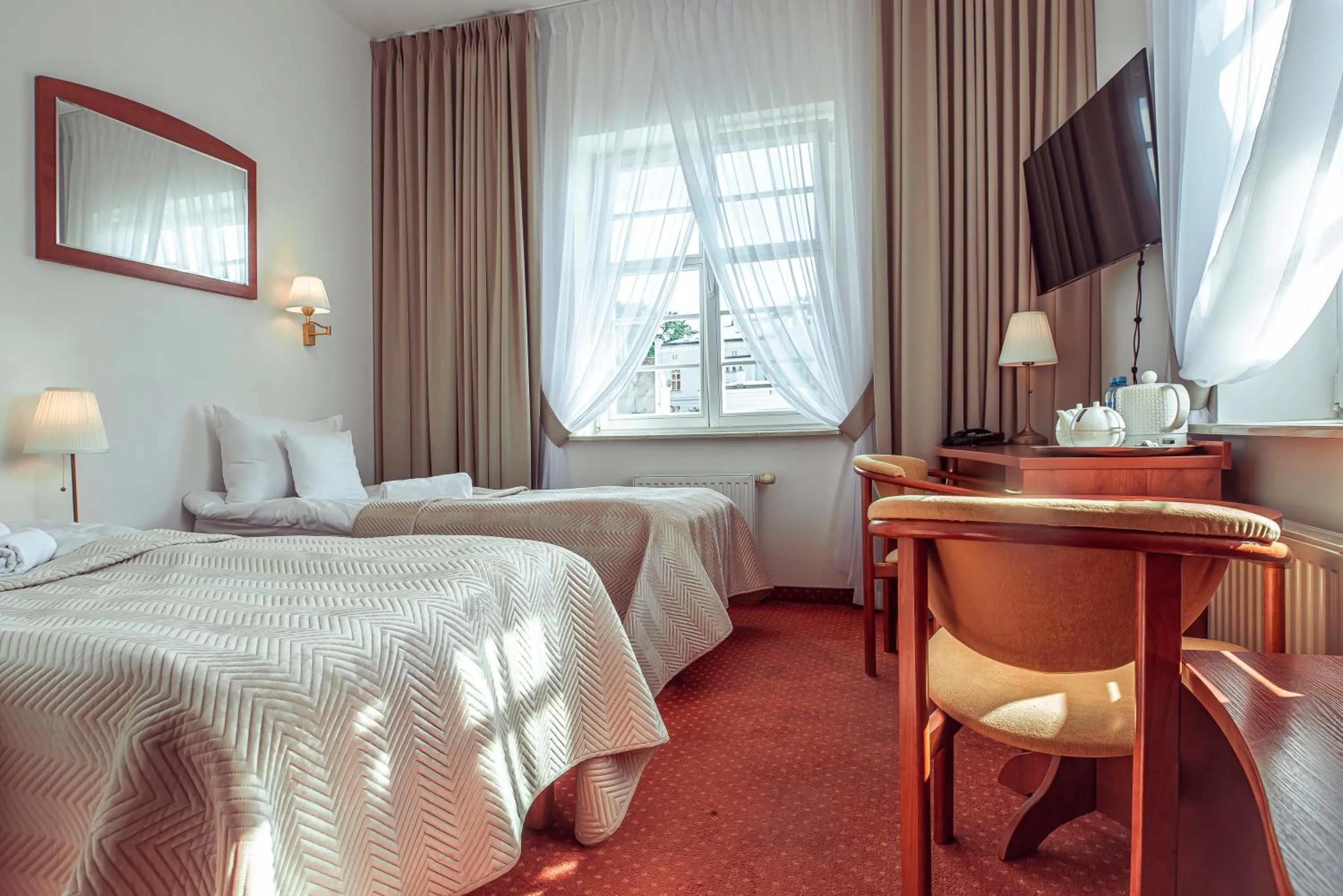 Bed in Hotel Maxim Kwidzyn