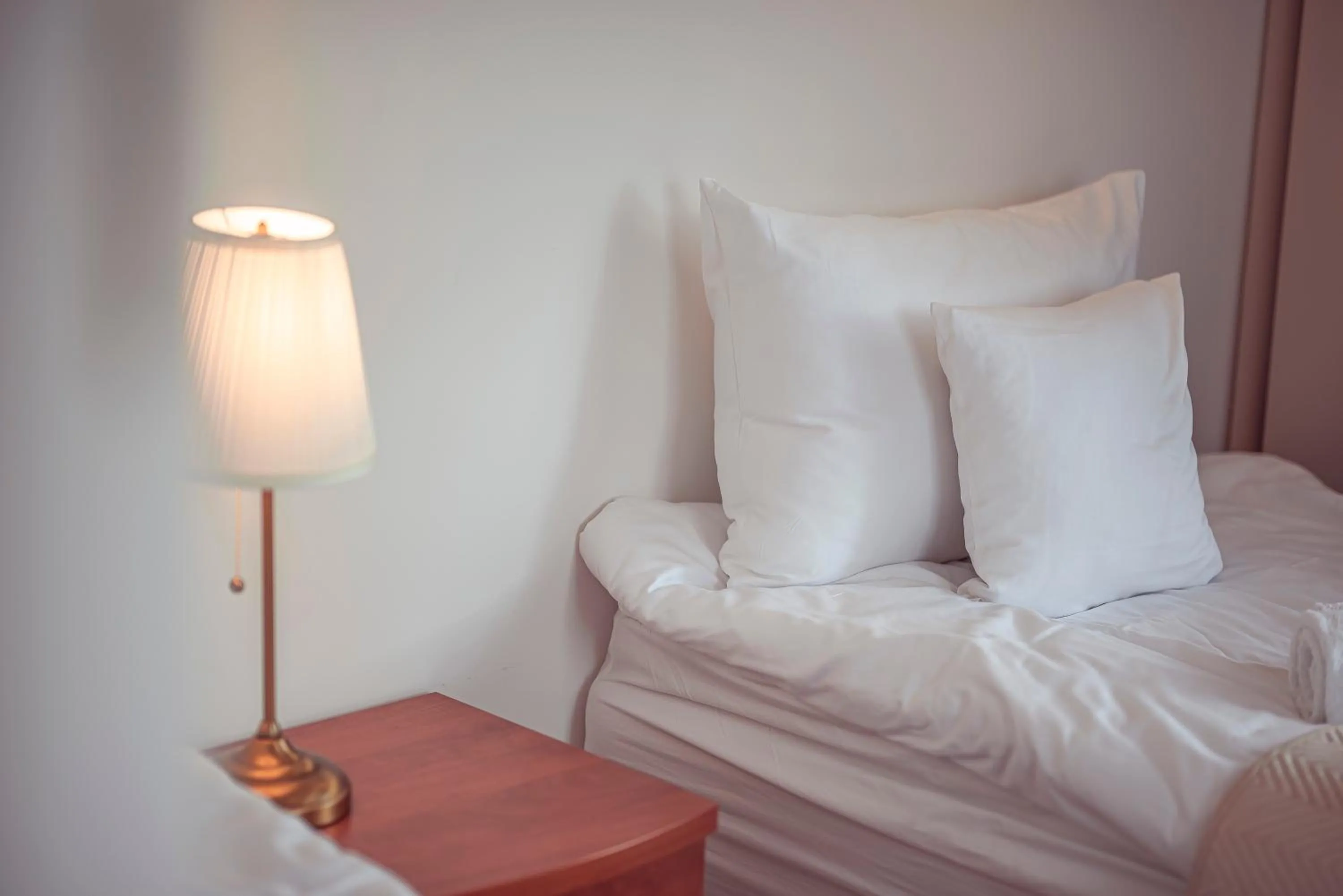 Bed in Hotel Maxim Kwidzyn