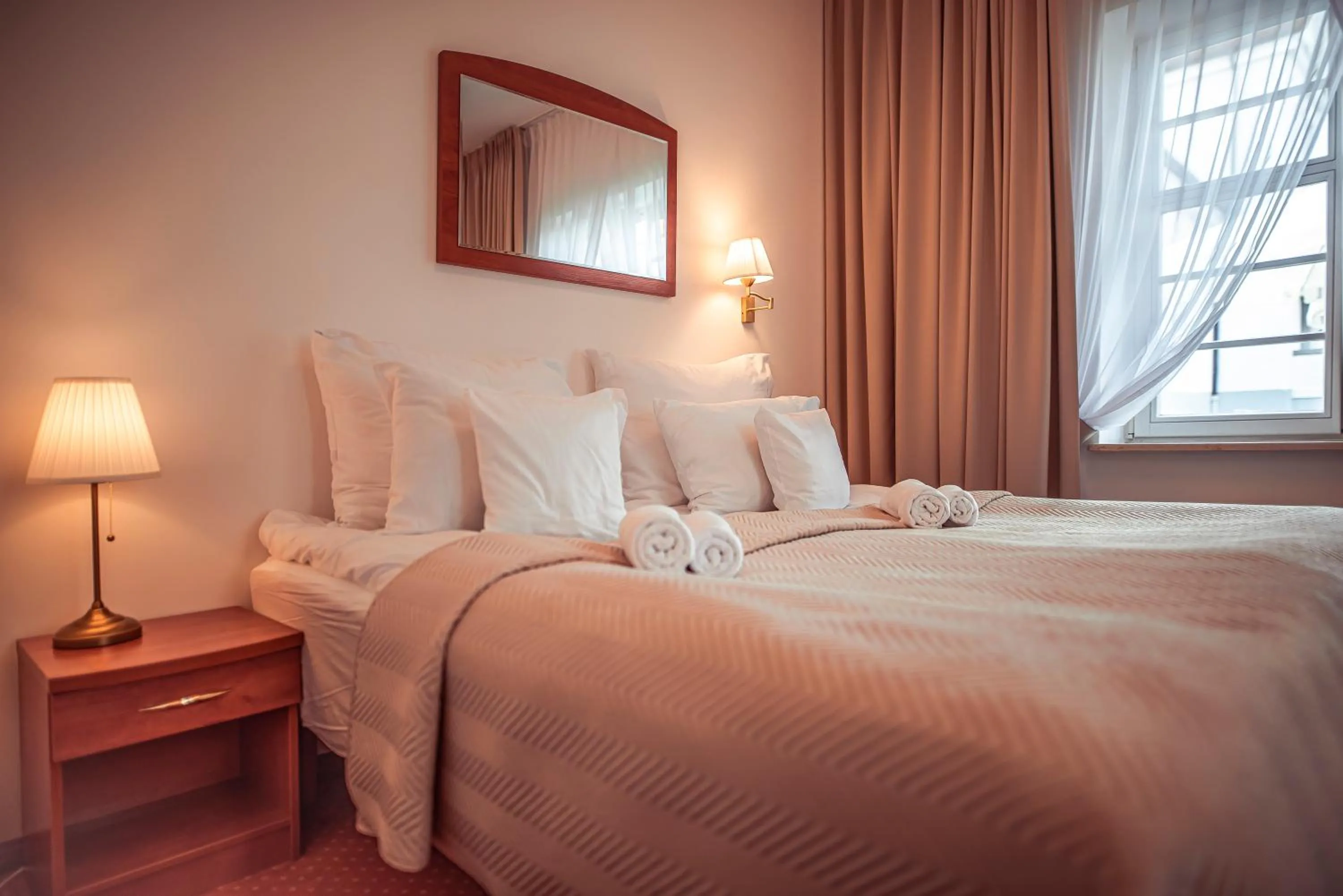 Bed in Hotel Maxim Kwidzyn