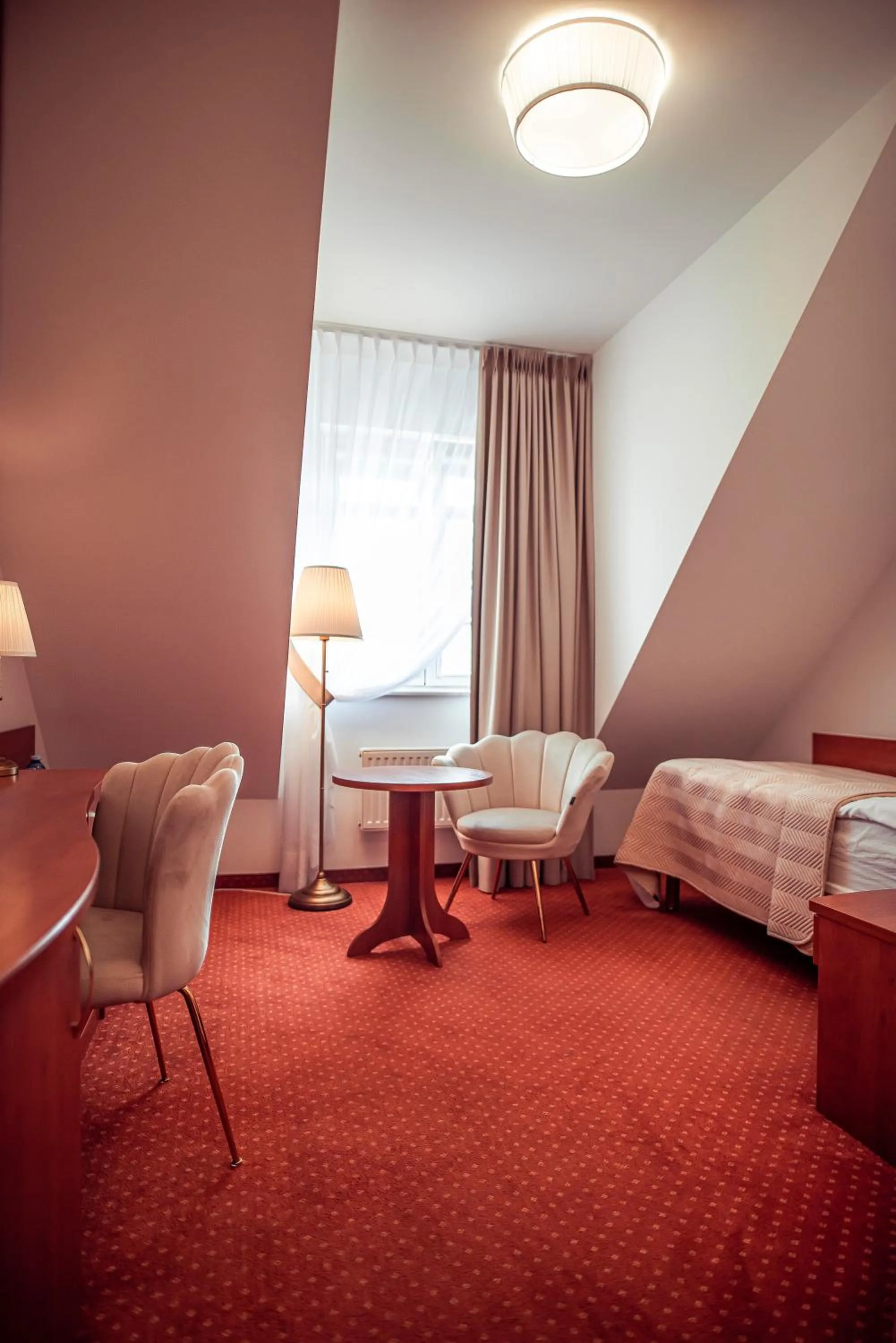 Bed in Hotel Maxim Kwidzyn