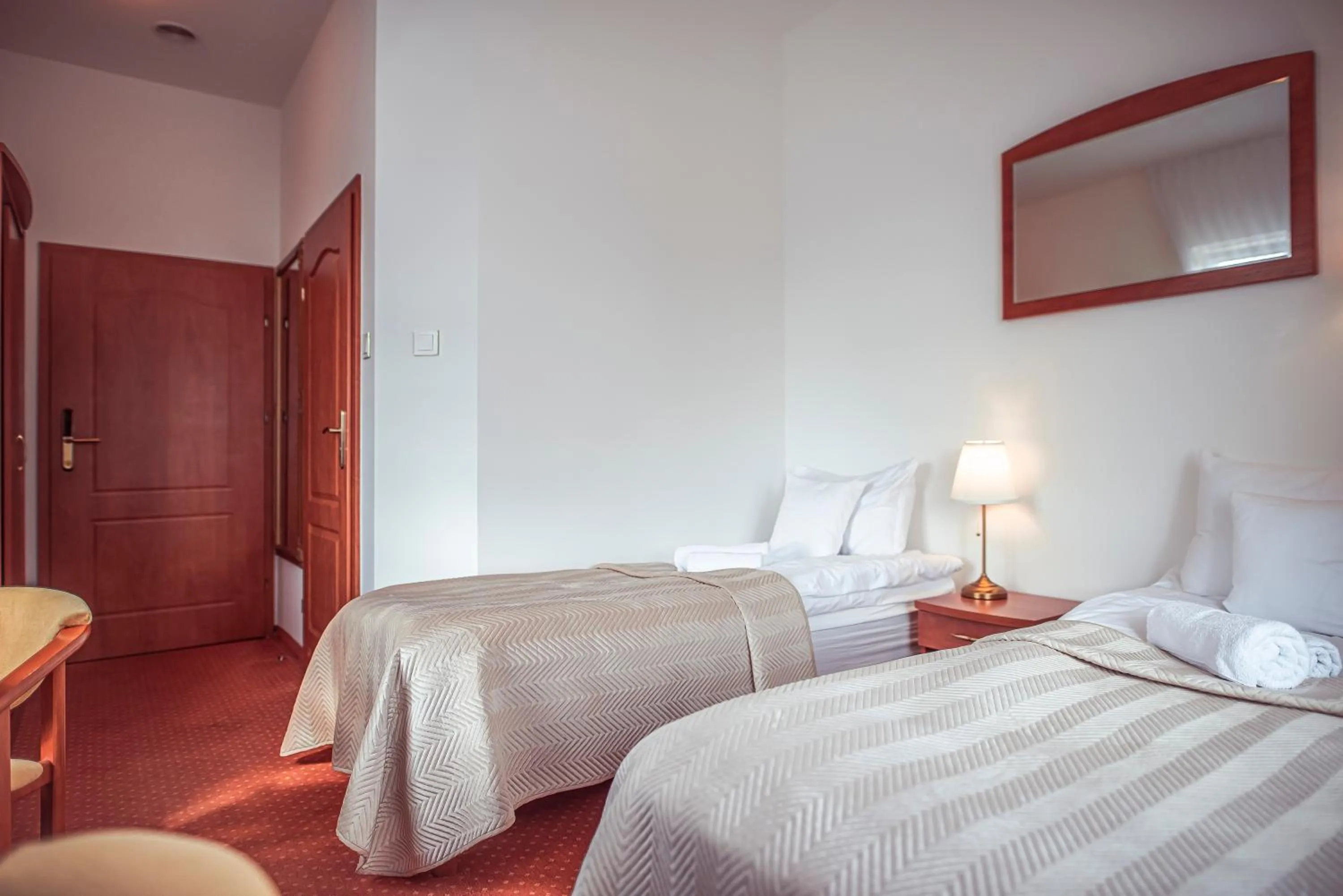 Bed in Hotel Maxim Kwidzyn