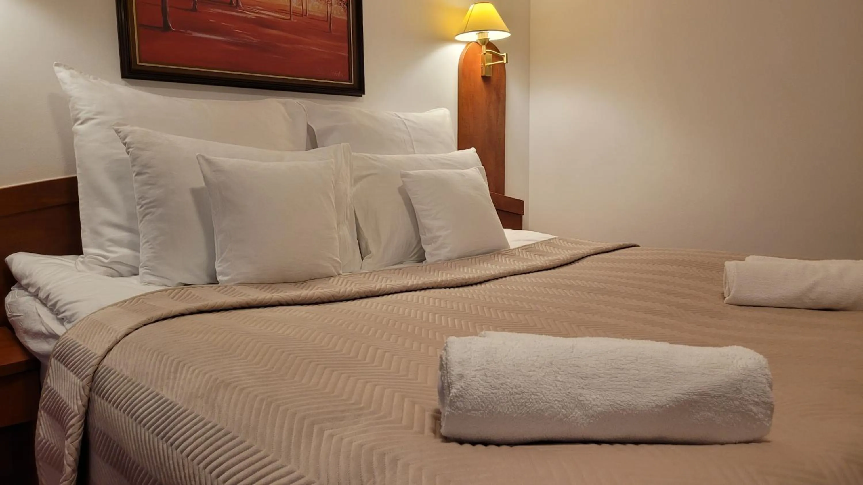 Bed in Hotel Maxim Kwidzyn