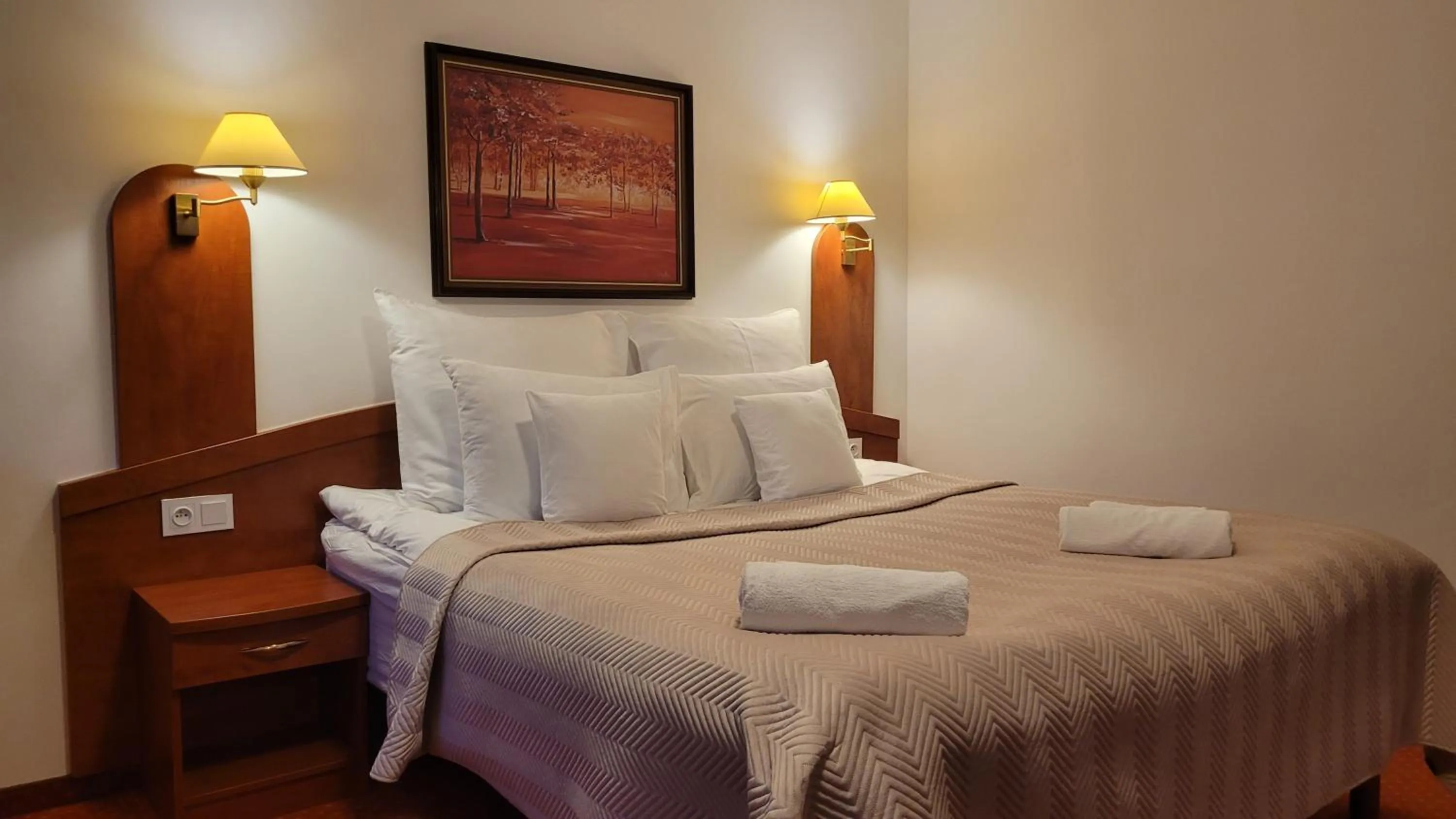 Bed in Hotel Maxim Kwidzyn