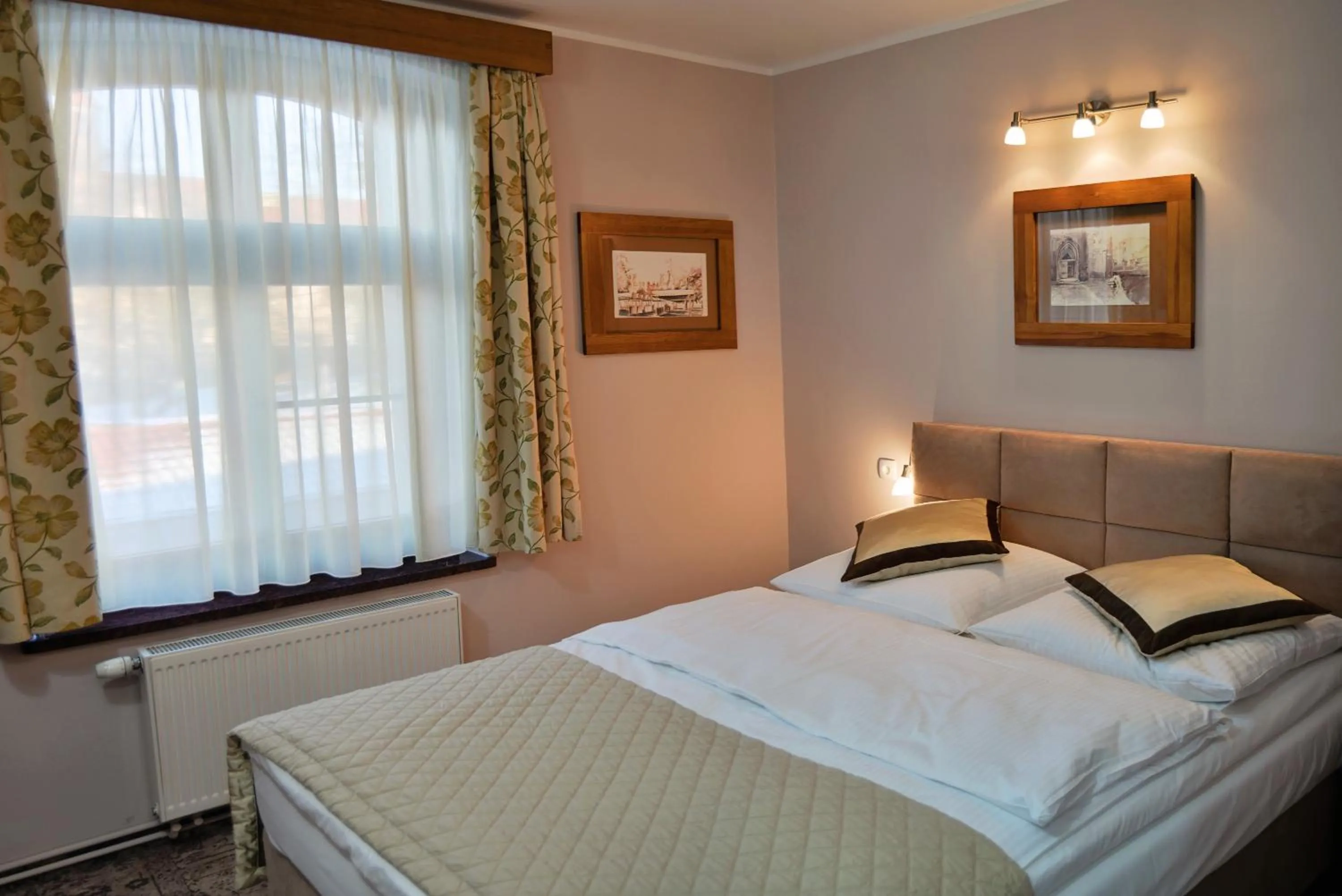 Bed in Hotel Karczma Chełmińska