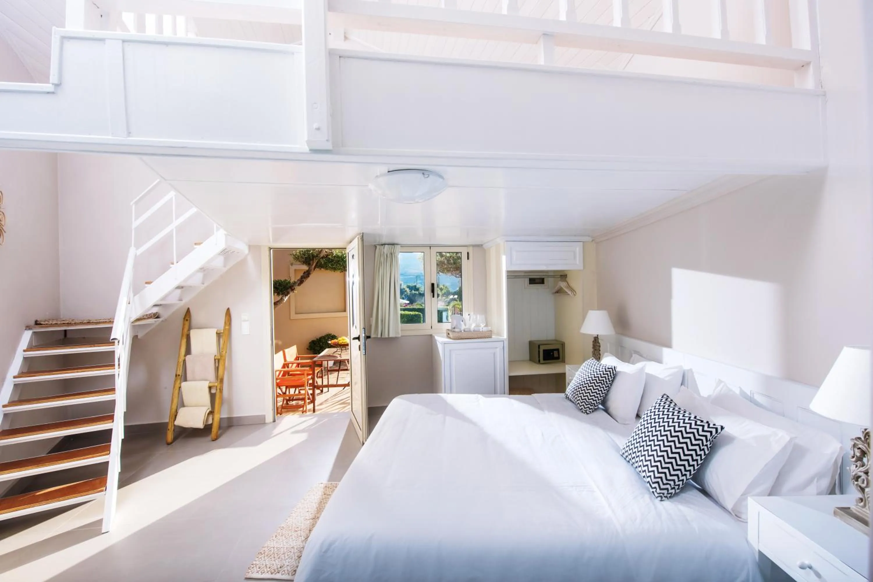 Bed in Notos Heights Hotel & Suites