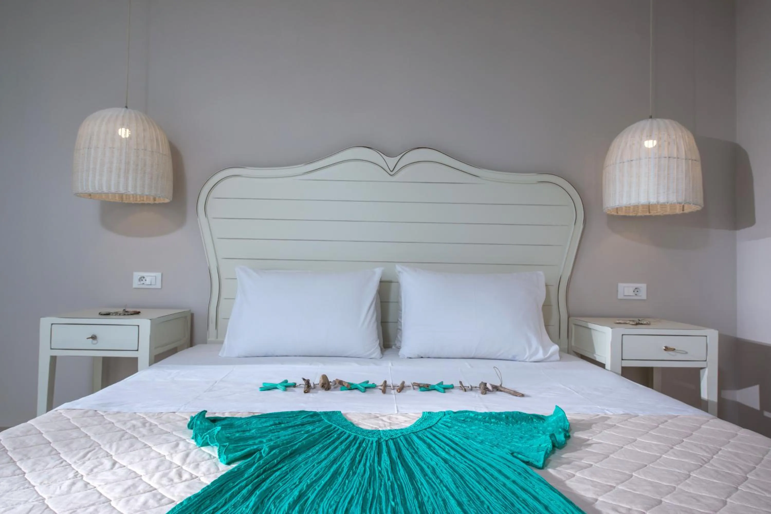 Bed in Notos Heights Hotel & Suites