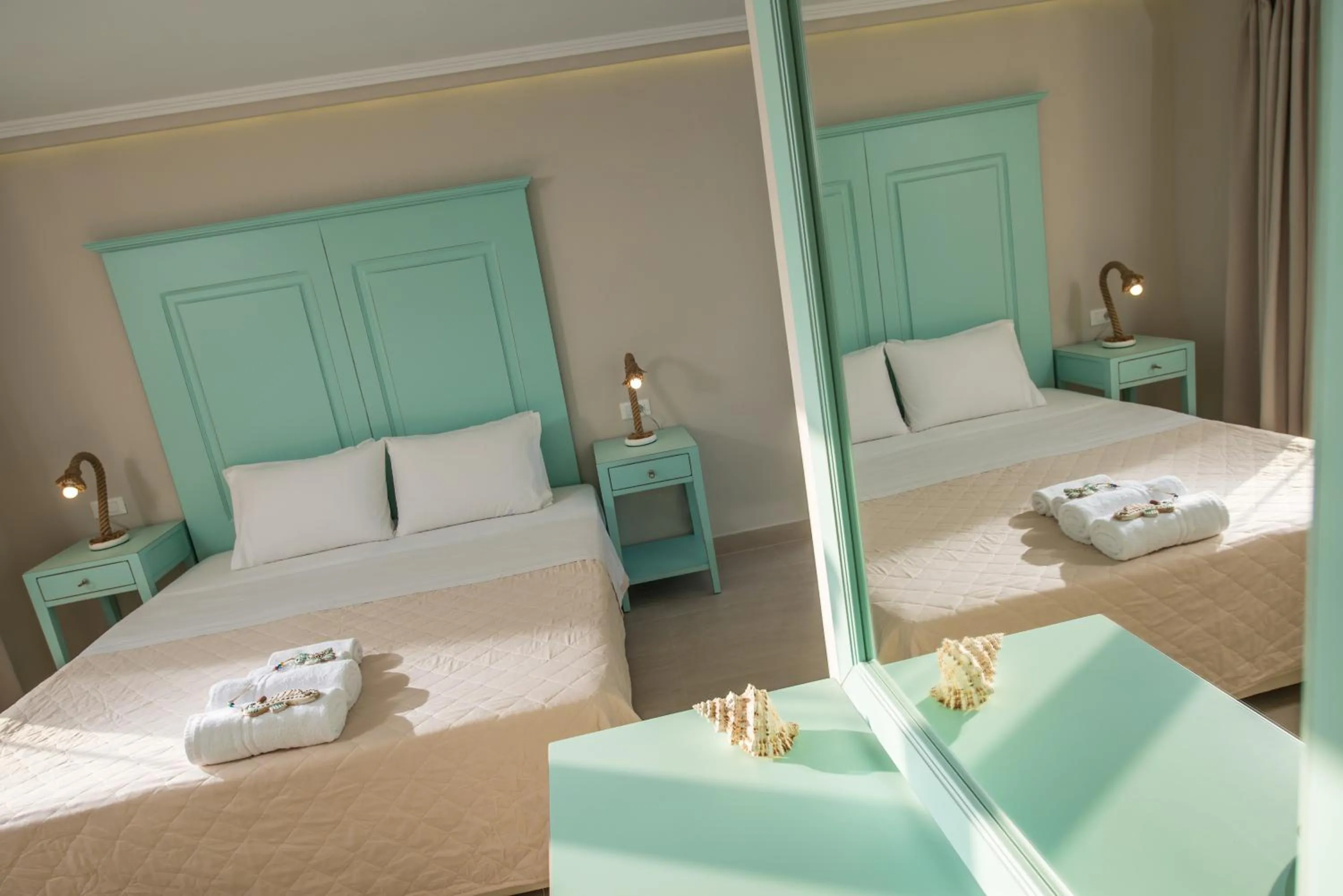 Bed in Notos Heights Hotel & Suites