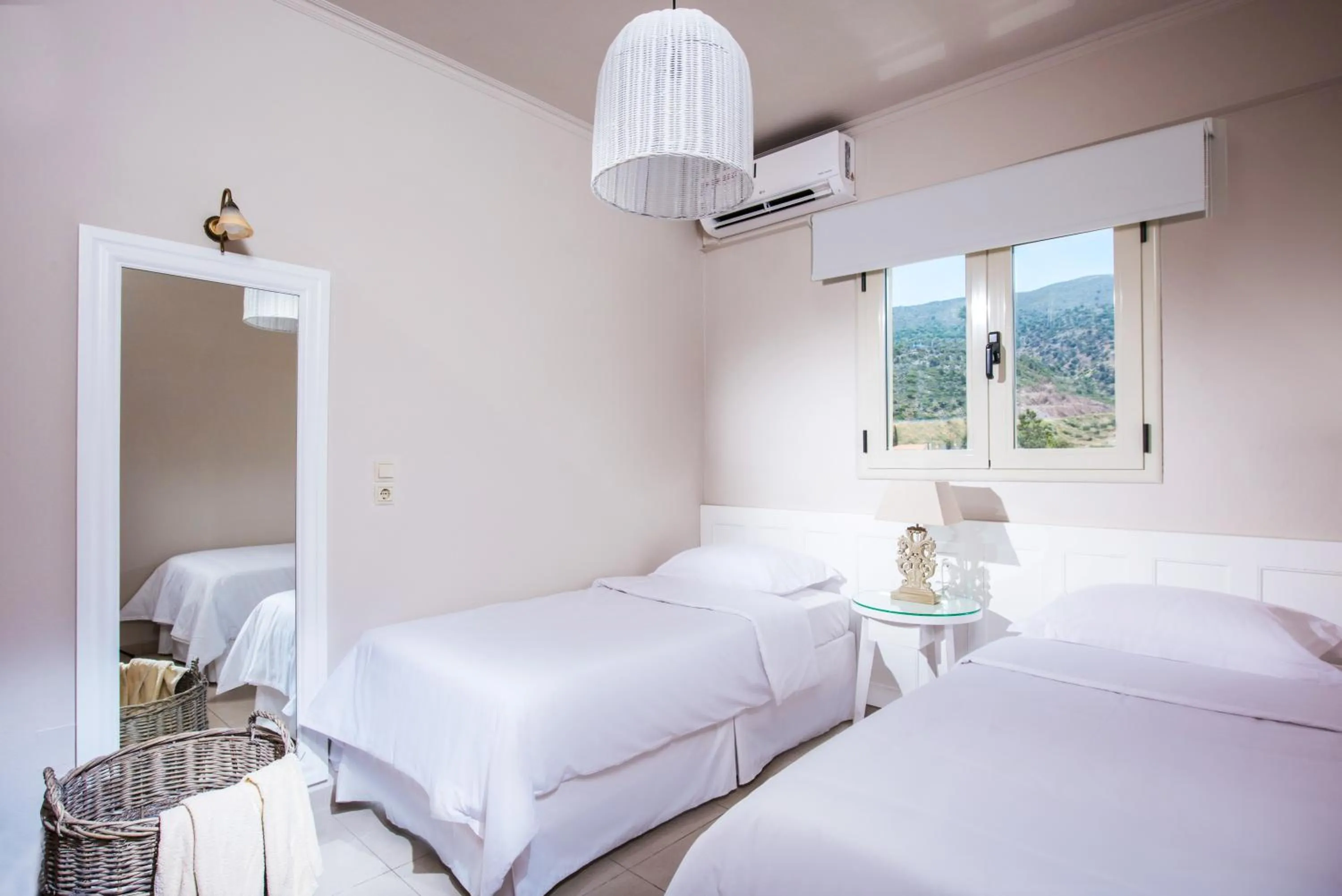 Bed in Notos Heights Hotel & Suites