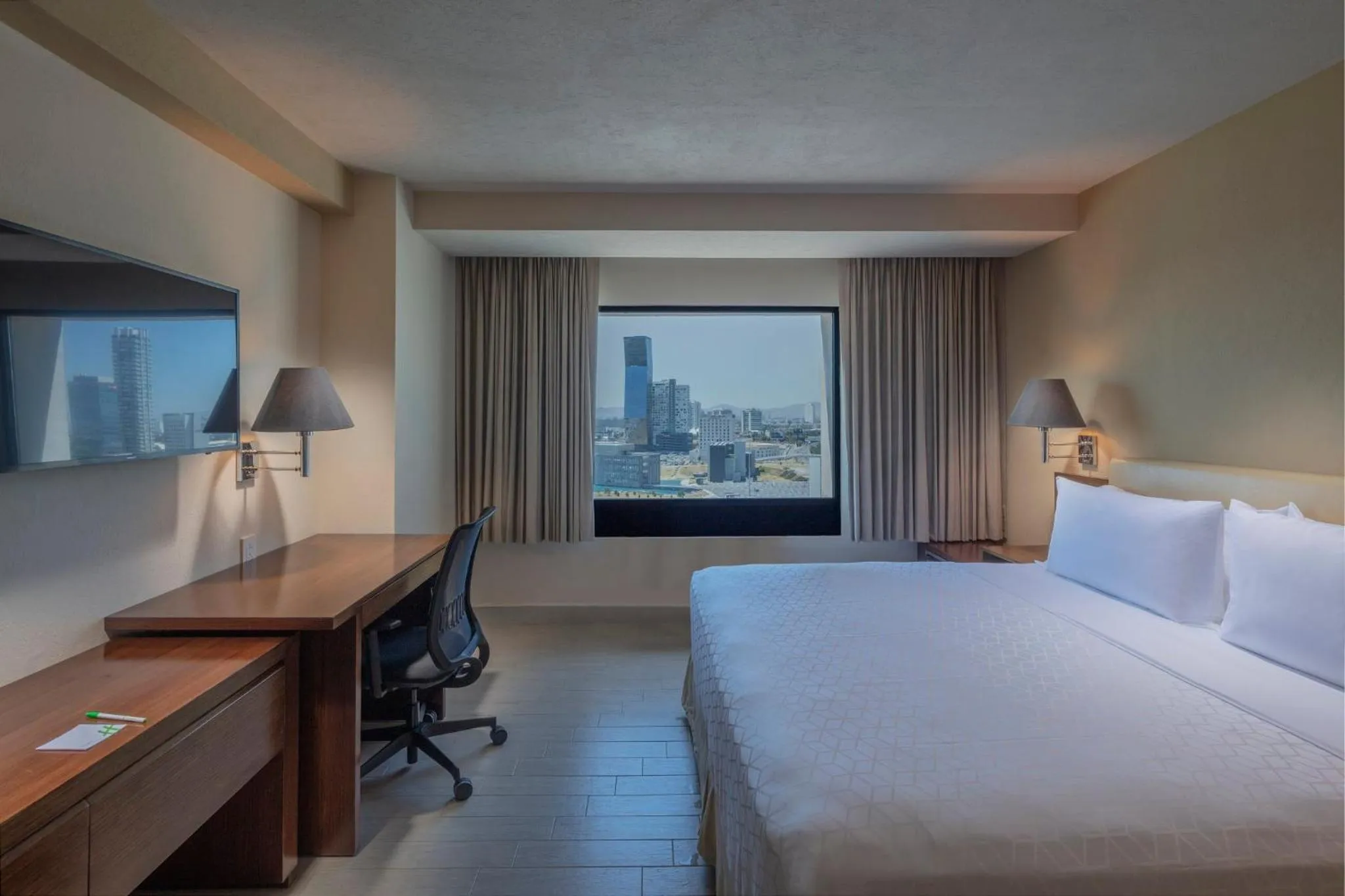 Photo of the whole room, Bed in Holiday Inn Puebla La Noria by IHG