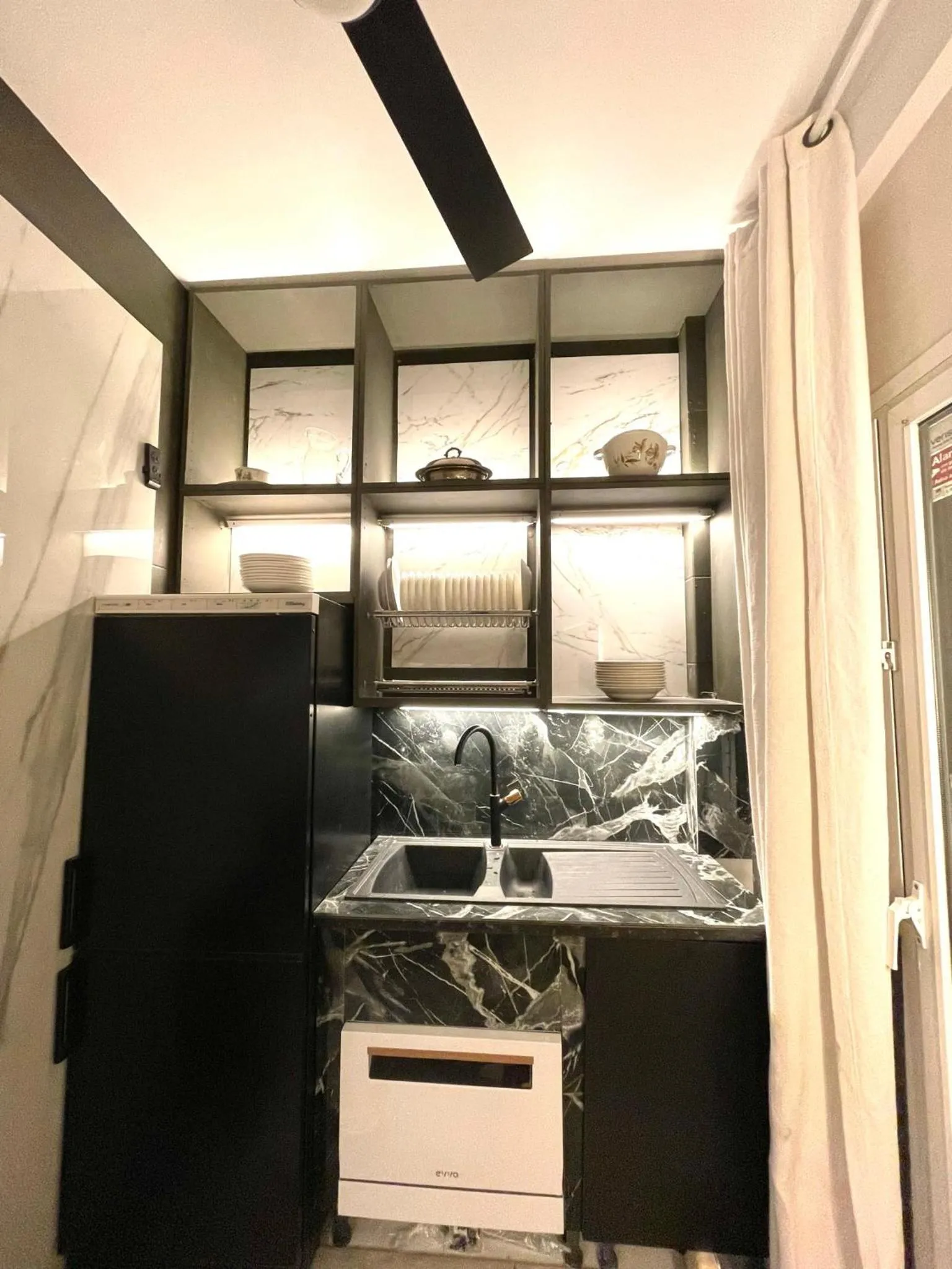 Kitchen or kitchenette in madrid central gran via Suites