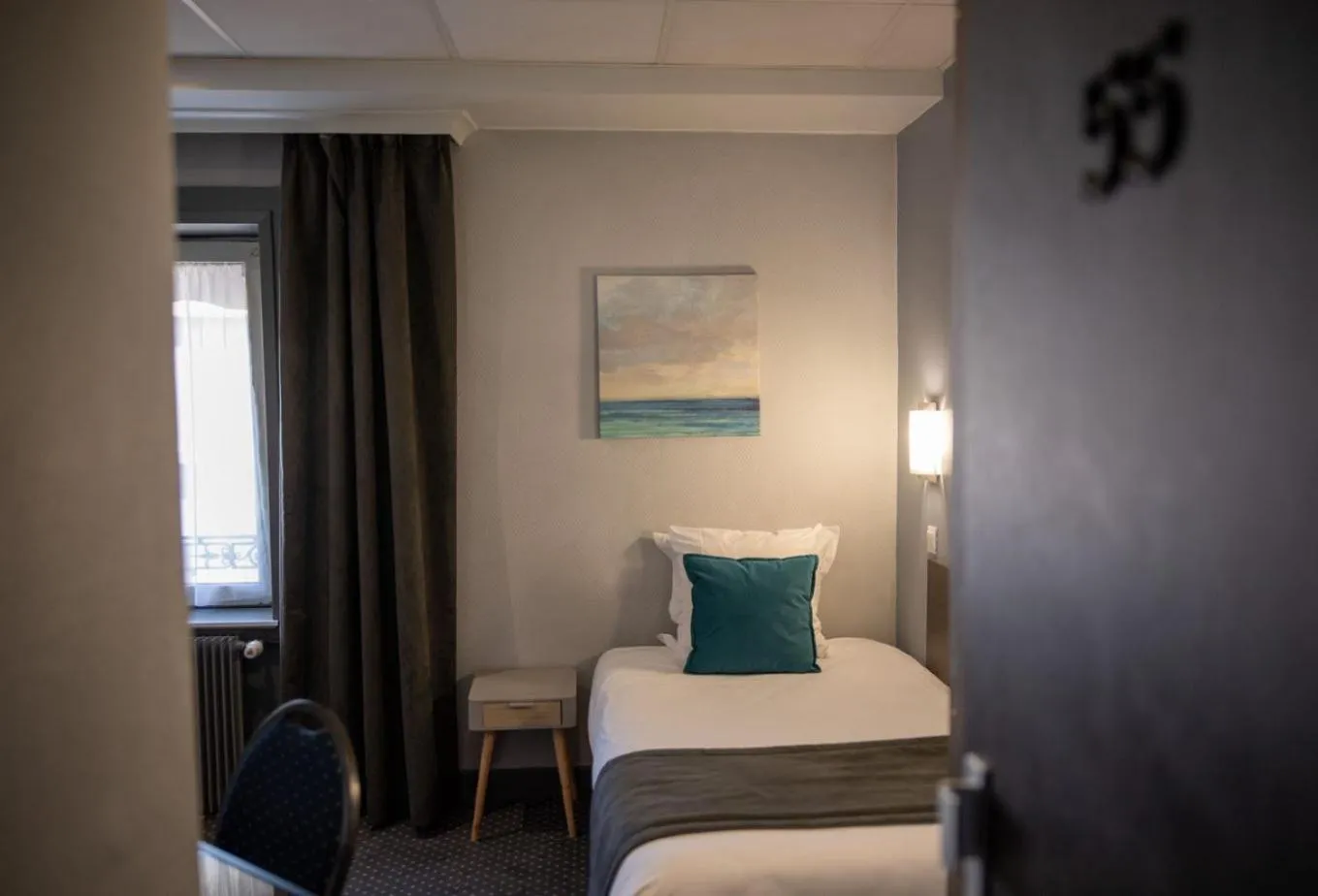 Bed in Hotel de Normandie