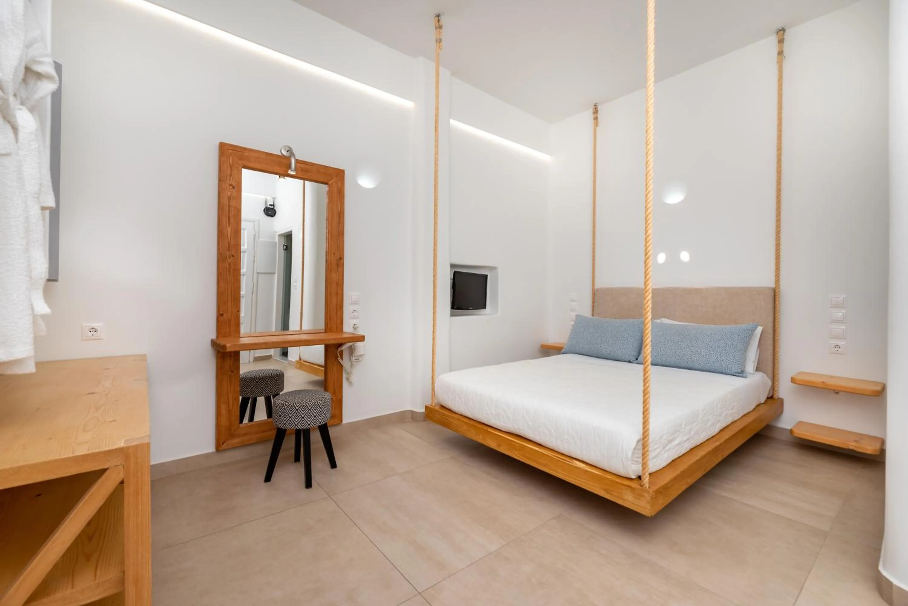 Bed in Hotel Thira