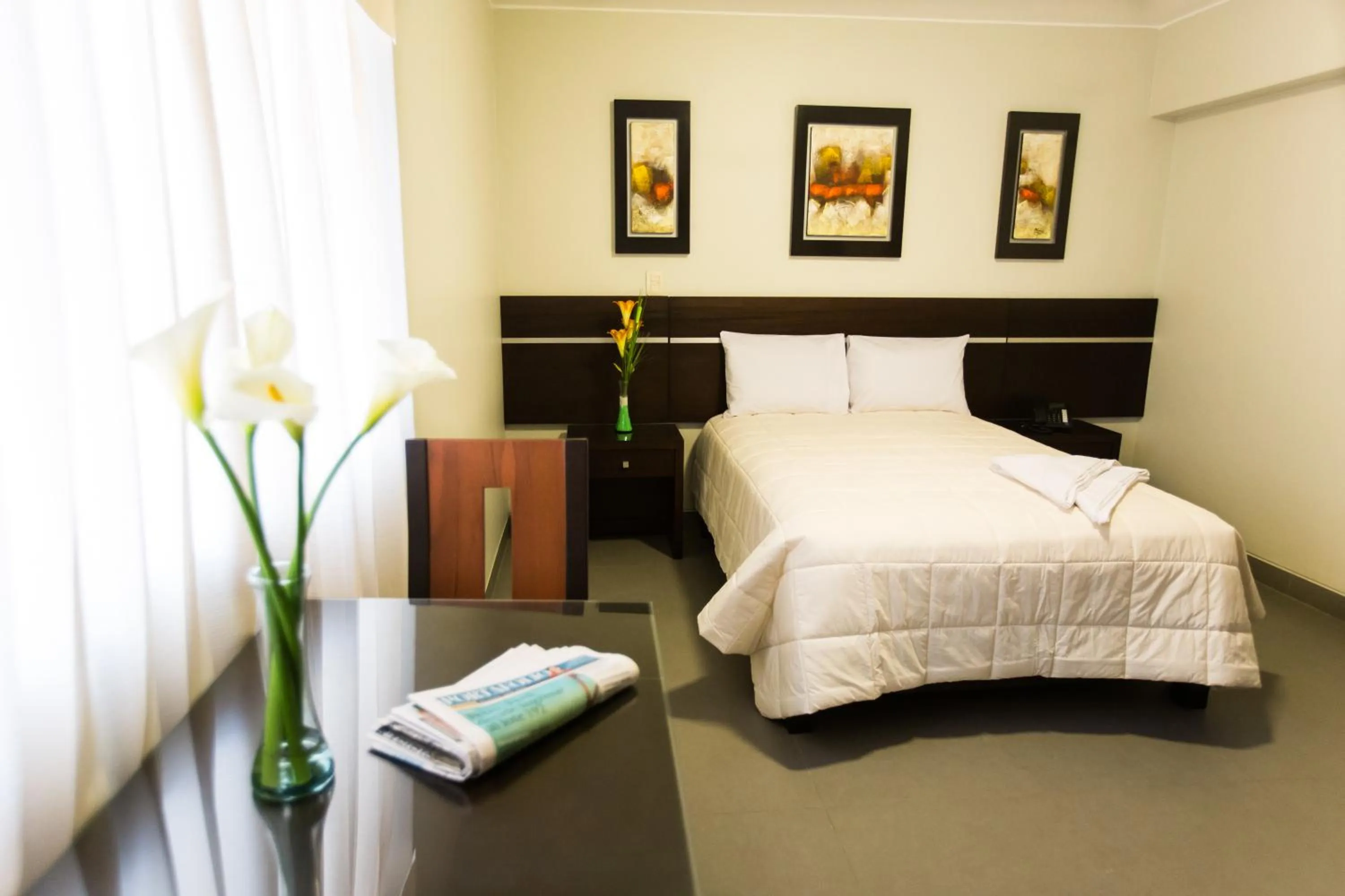 Photo of the whole room, Bed in Mariategui Hotel & Suites