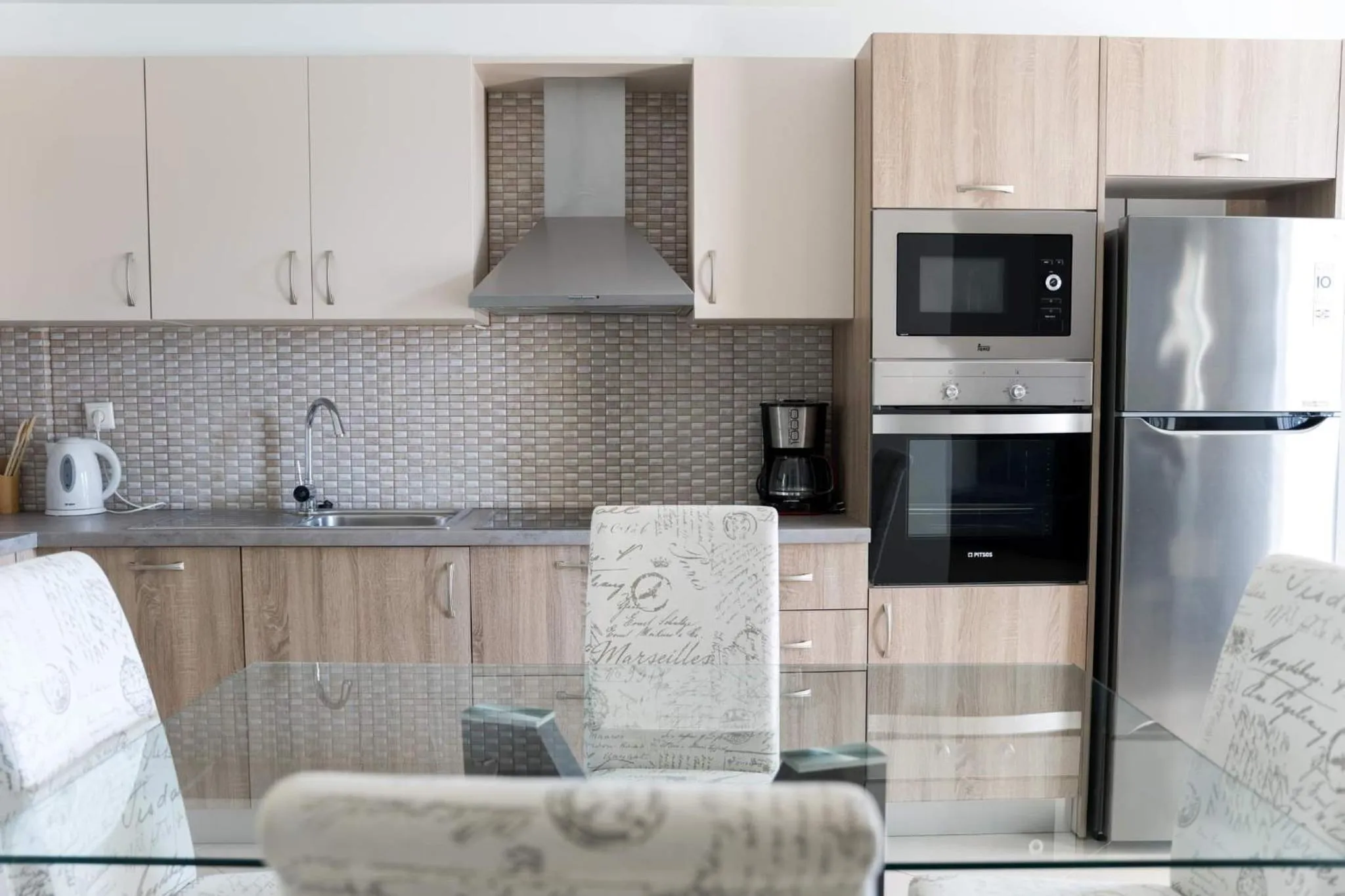 Kitchen or kitchenette in Diwani Luxury Villas