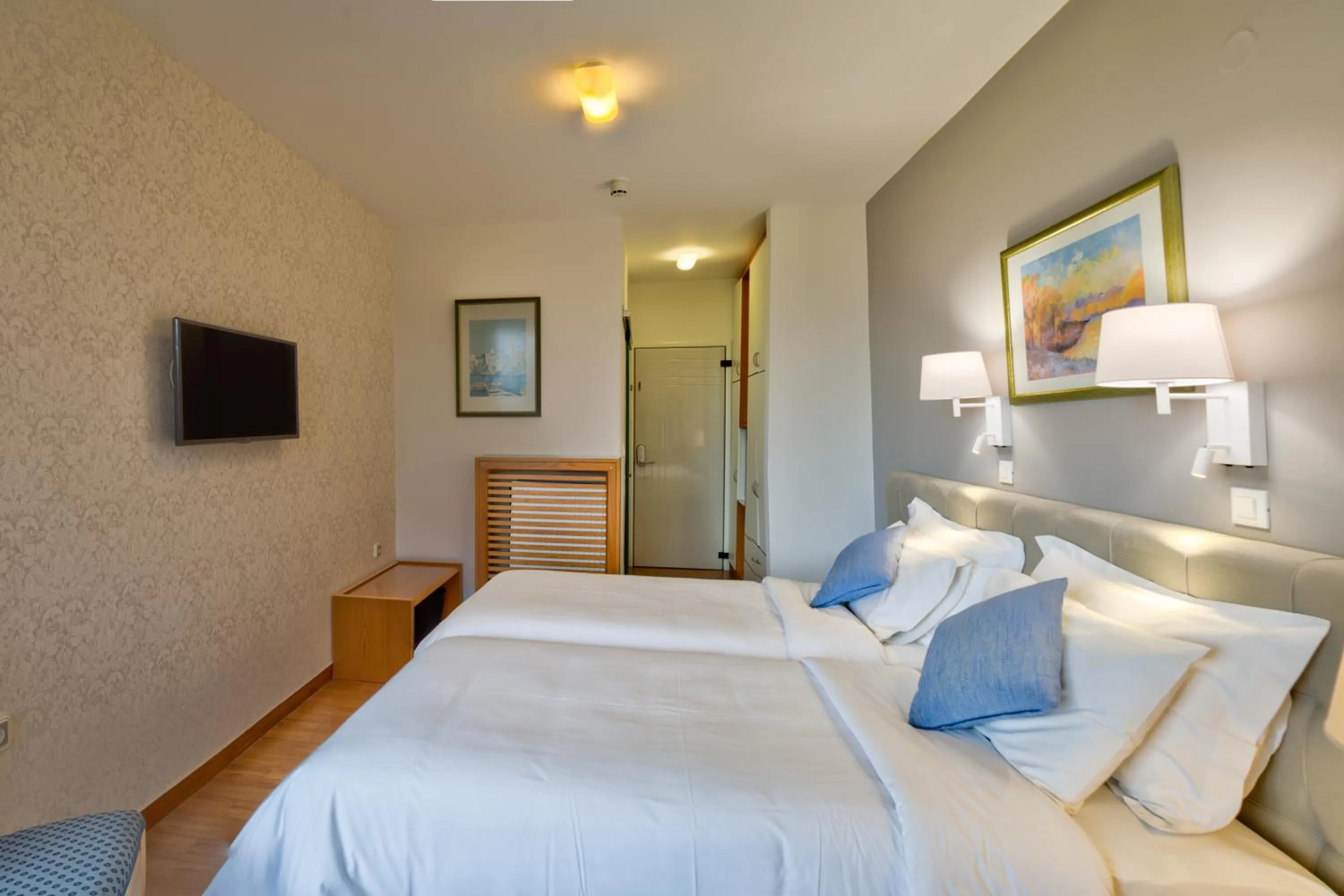 Bed in Poseidon Hotel