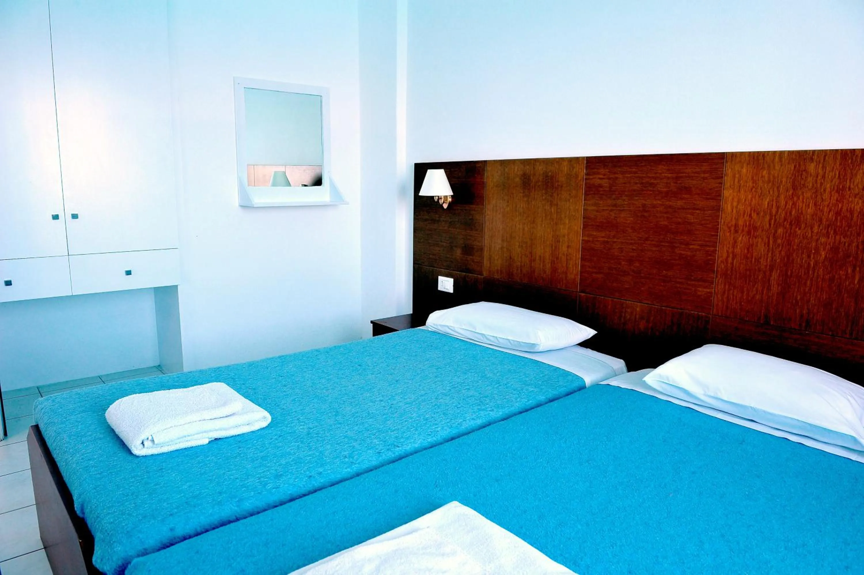 Bed in Mirabella Apartments