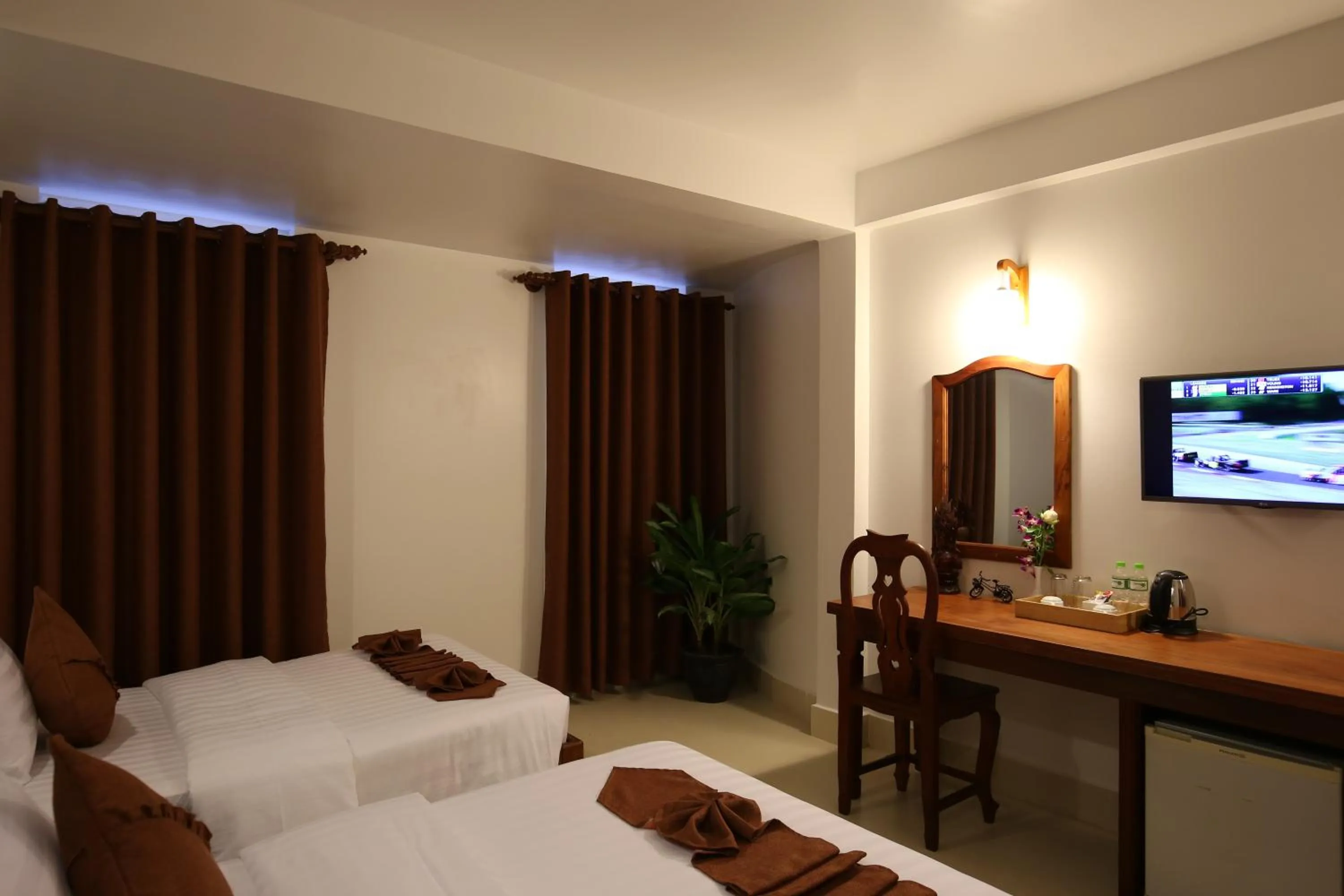 Bed in Holy Angkor Hotel