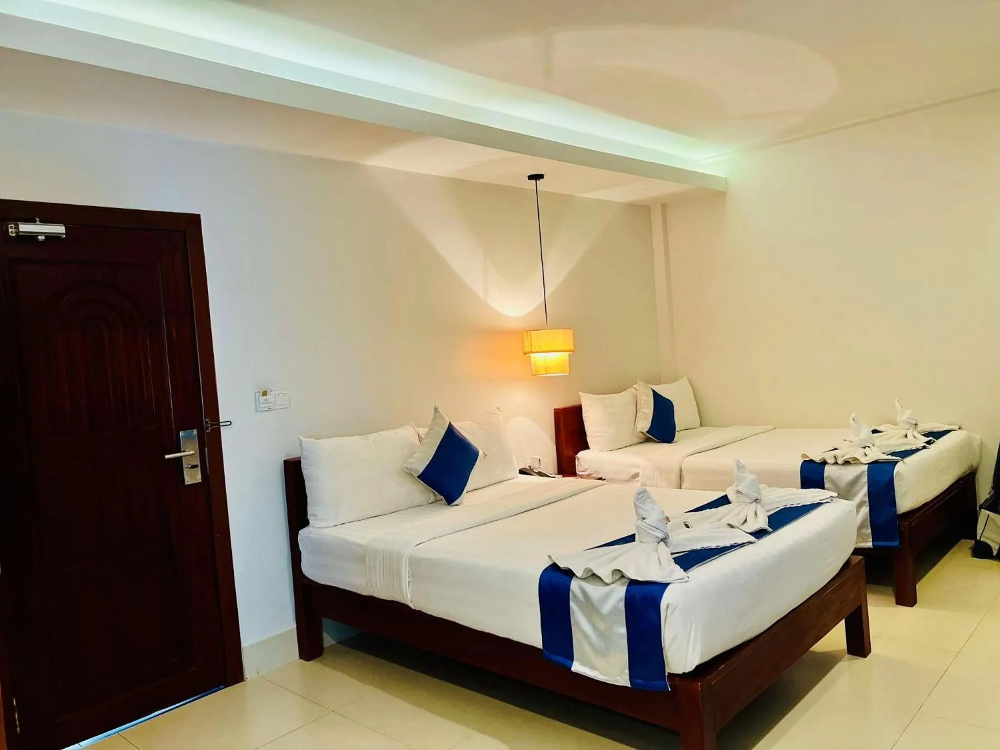 Bed in Holy Angkor Hotel