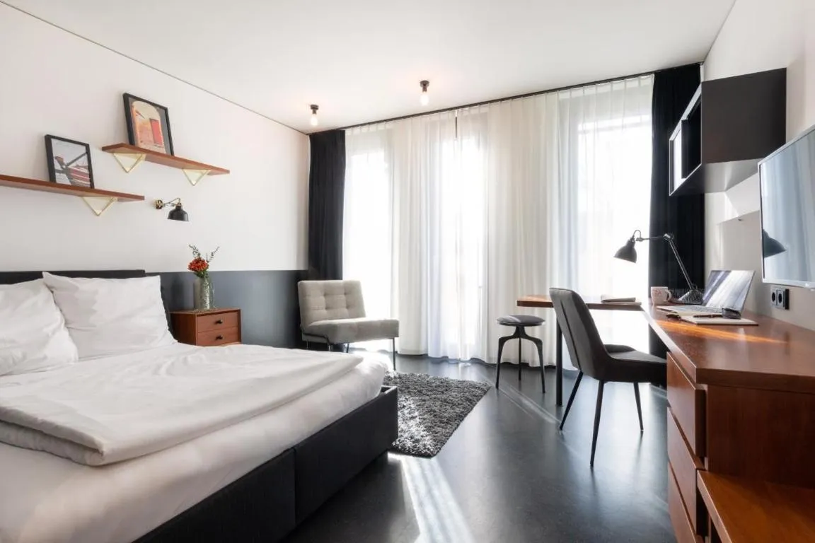 Seating area, Bed in Brera Serviced Apartments Munich Schwabing