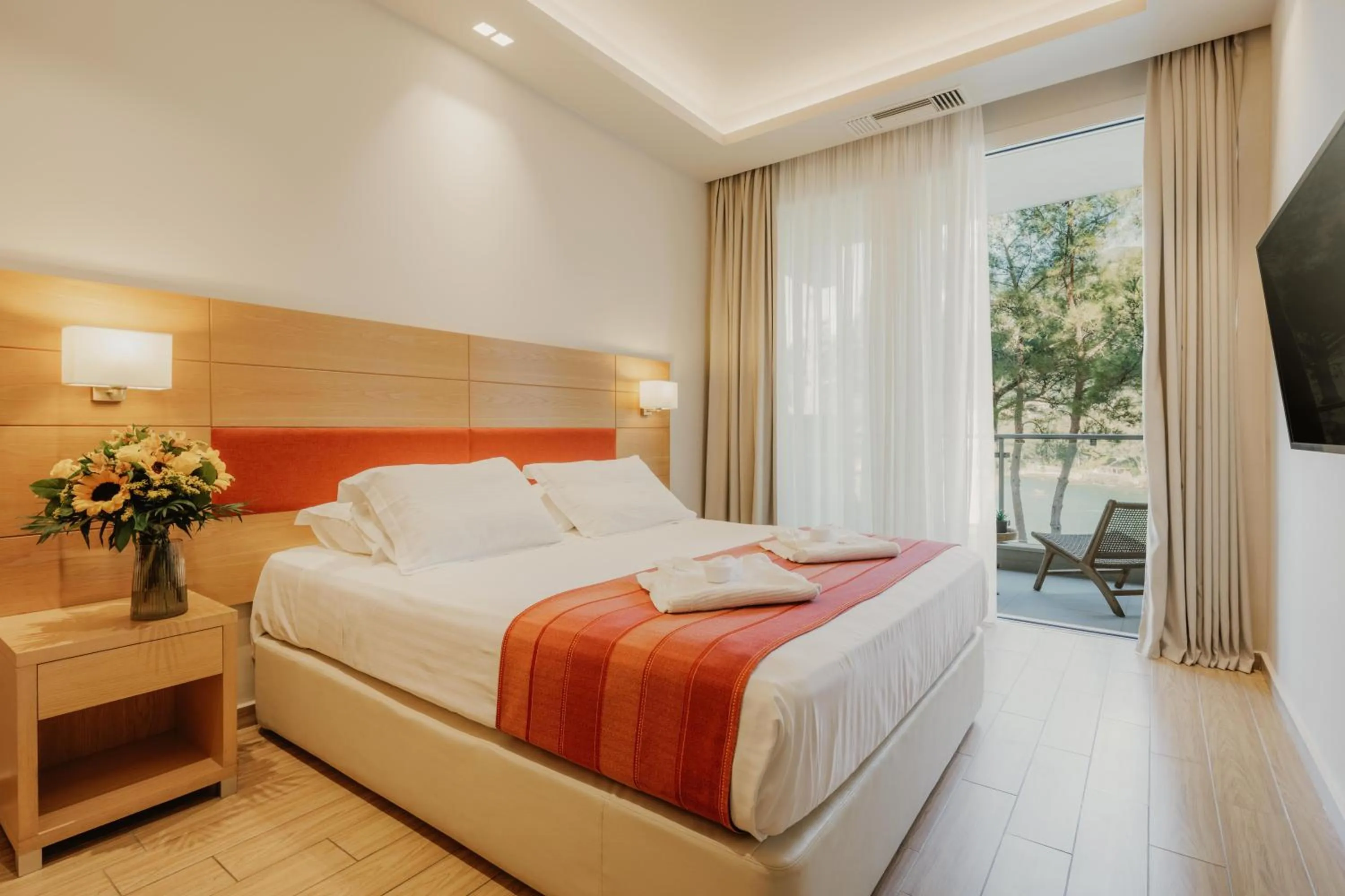 Bedroom, Bed in Akrotiri Beach Resort & Spa - Adult Friendly