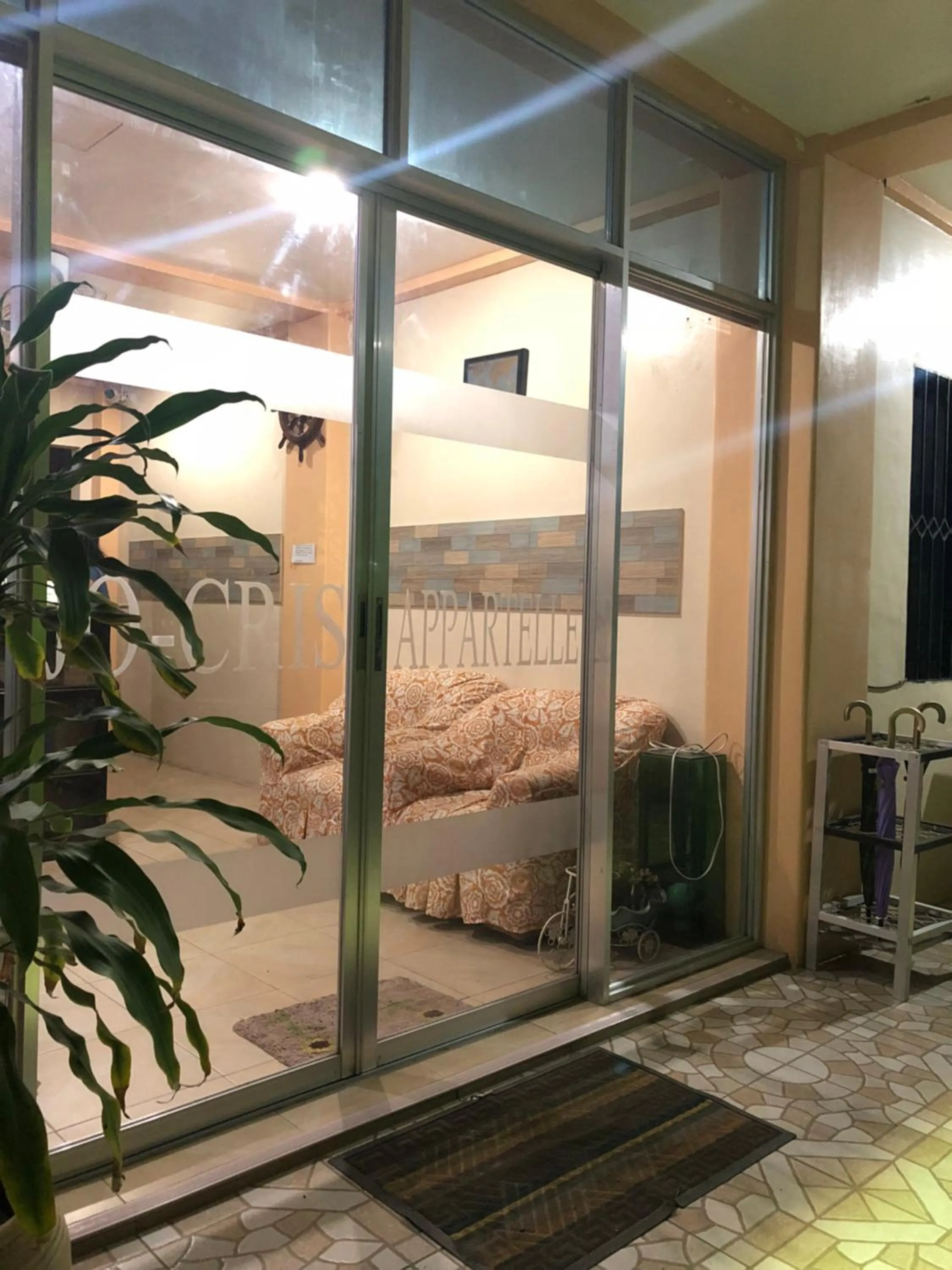 Facade/entrance, Bed in Jo-Cris Apartelle