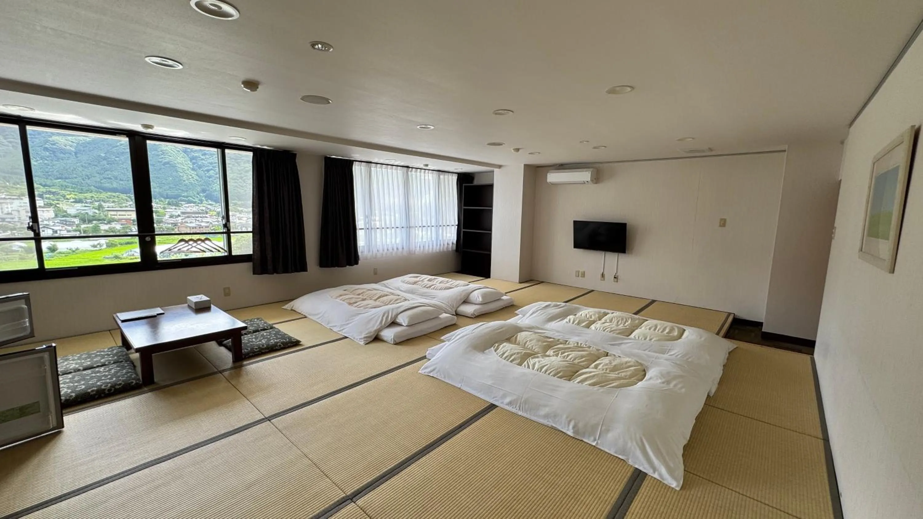 Photo of the whole room, Bed in Ryokan Yamanami